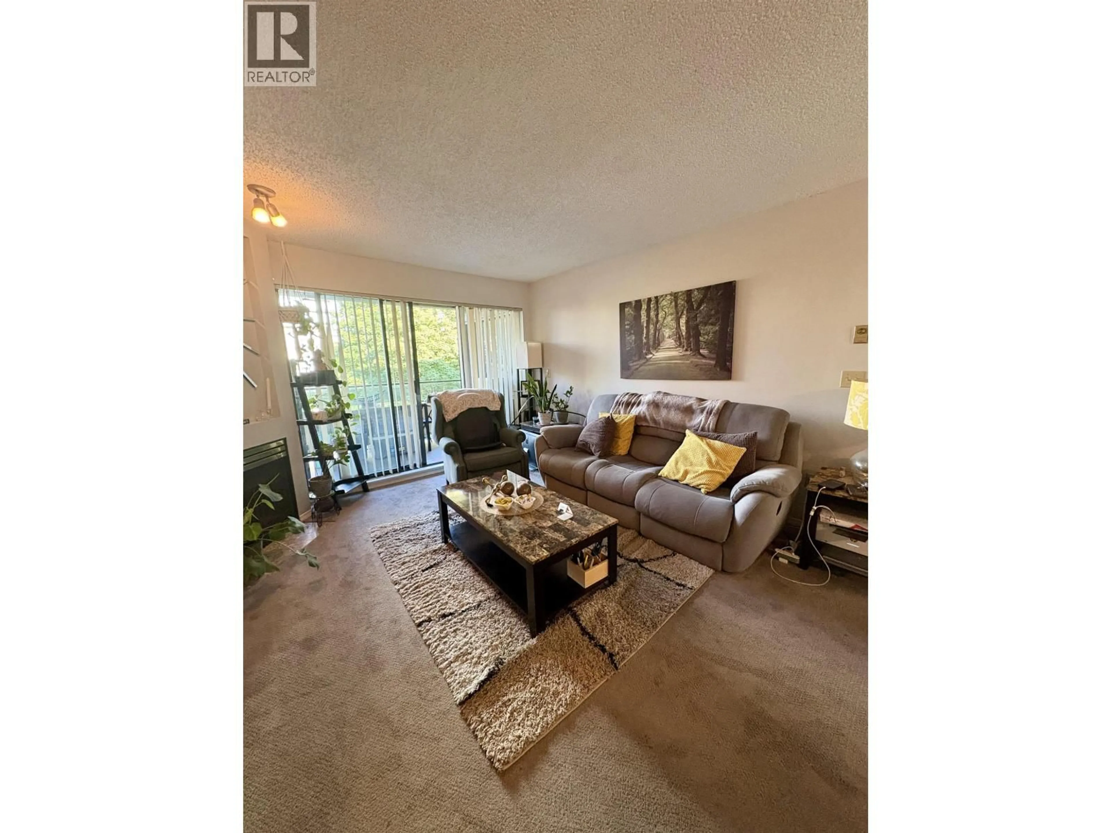 Living room with furniture, unknown for 308 - 2925 GLEN DRIVE, Coquitlam British Columbia V3B7H9