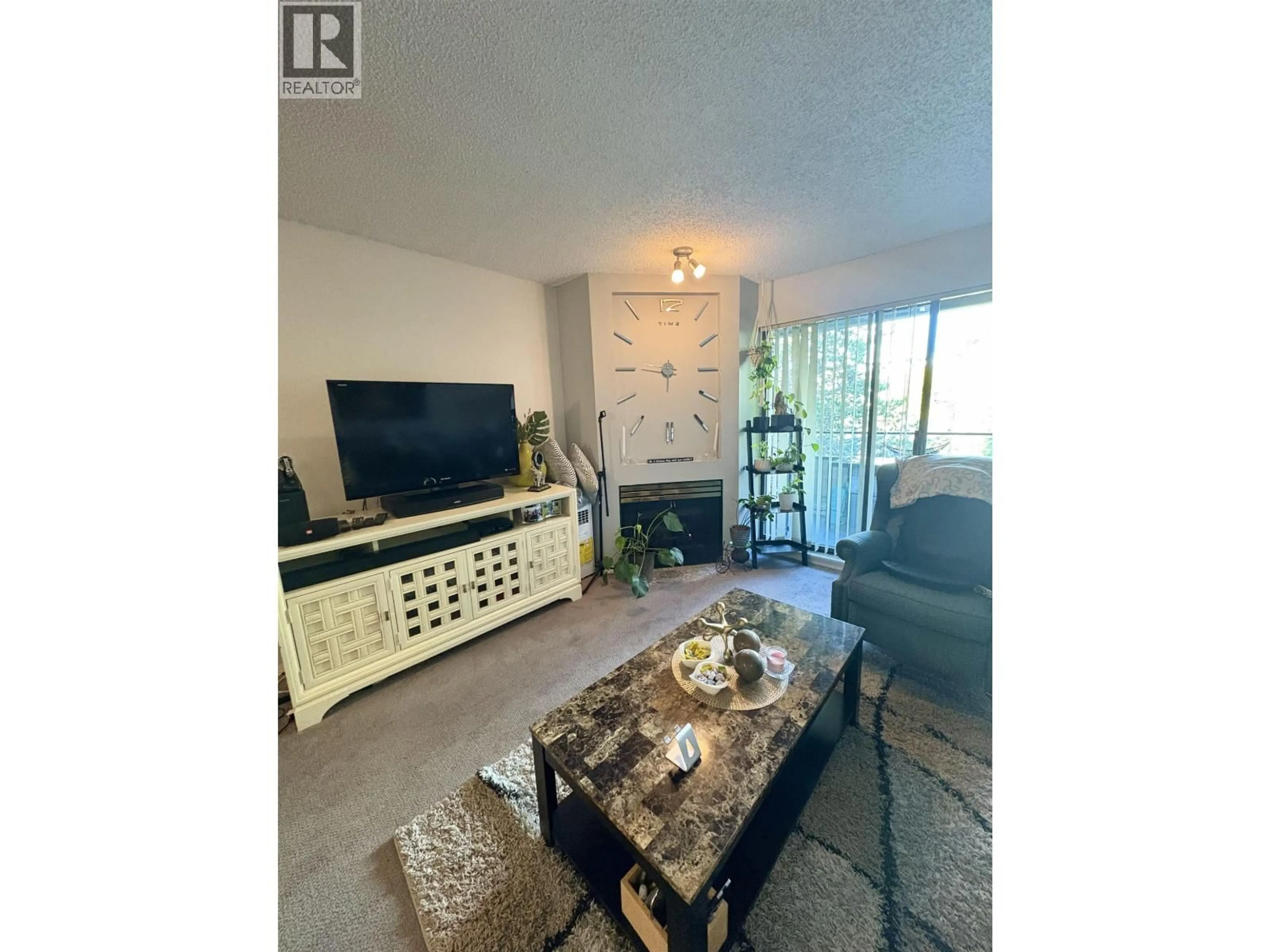 Living room with furniture, unknown for 308 - 2925 GLEN DRIVE, Coquitlam British Columbia V3B7H9