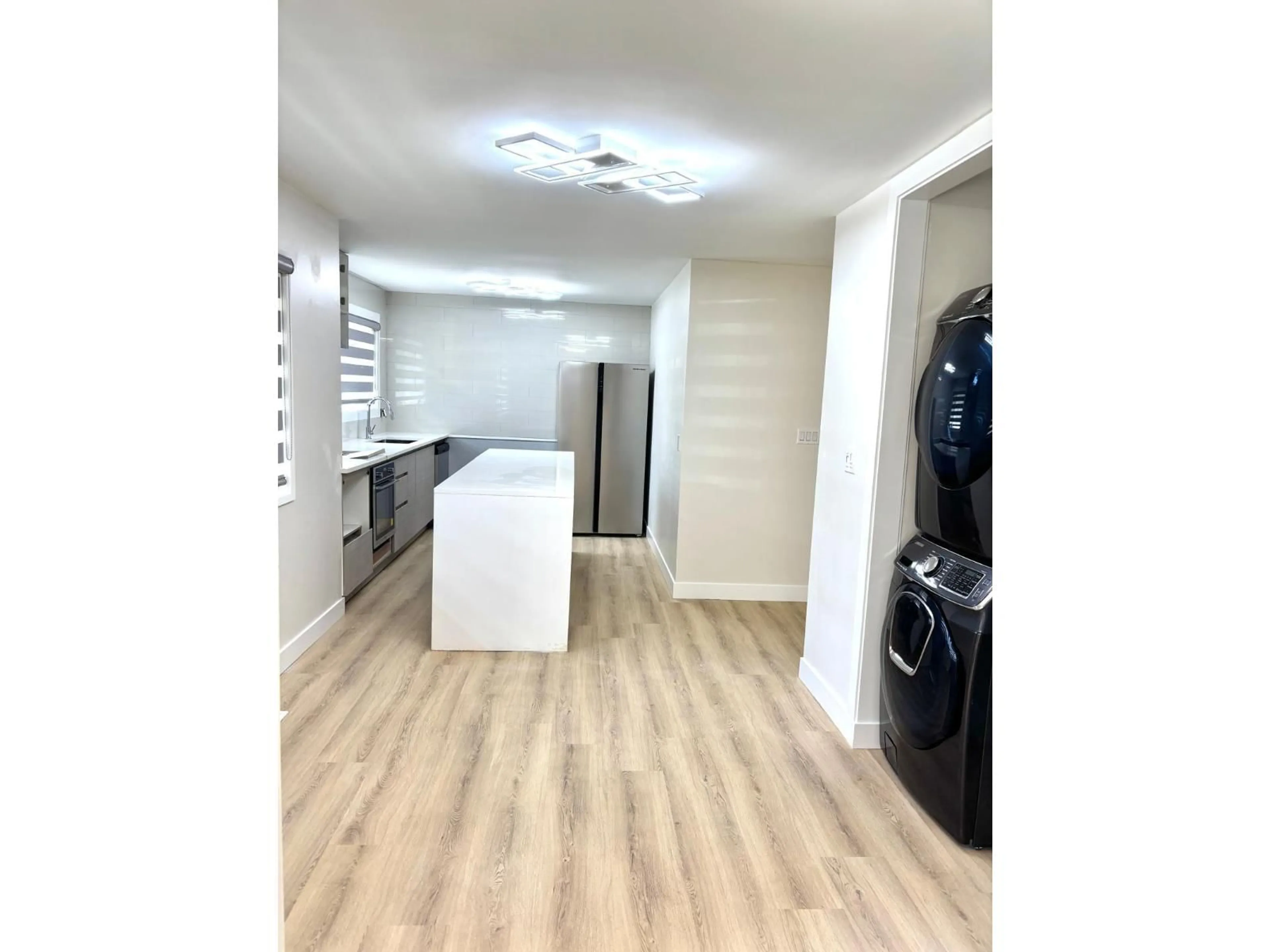 Kitchen with laundary machines, unknown for 20277 36 AVENUE, Langley British Columbia V3A6A5