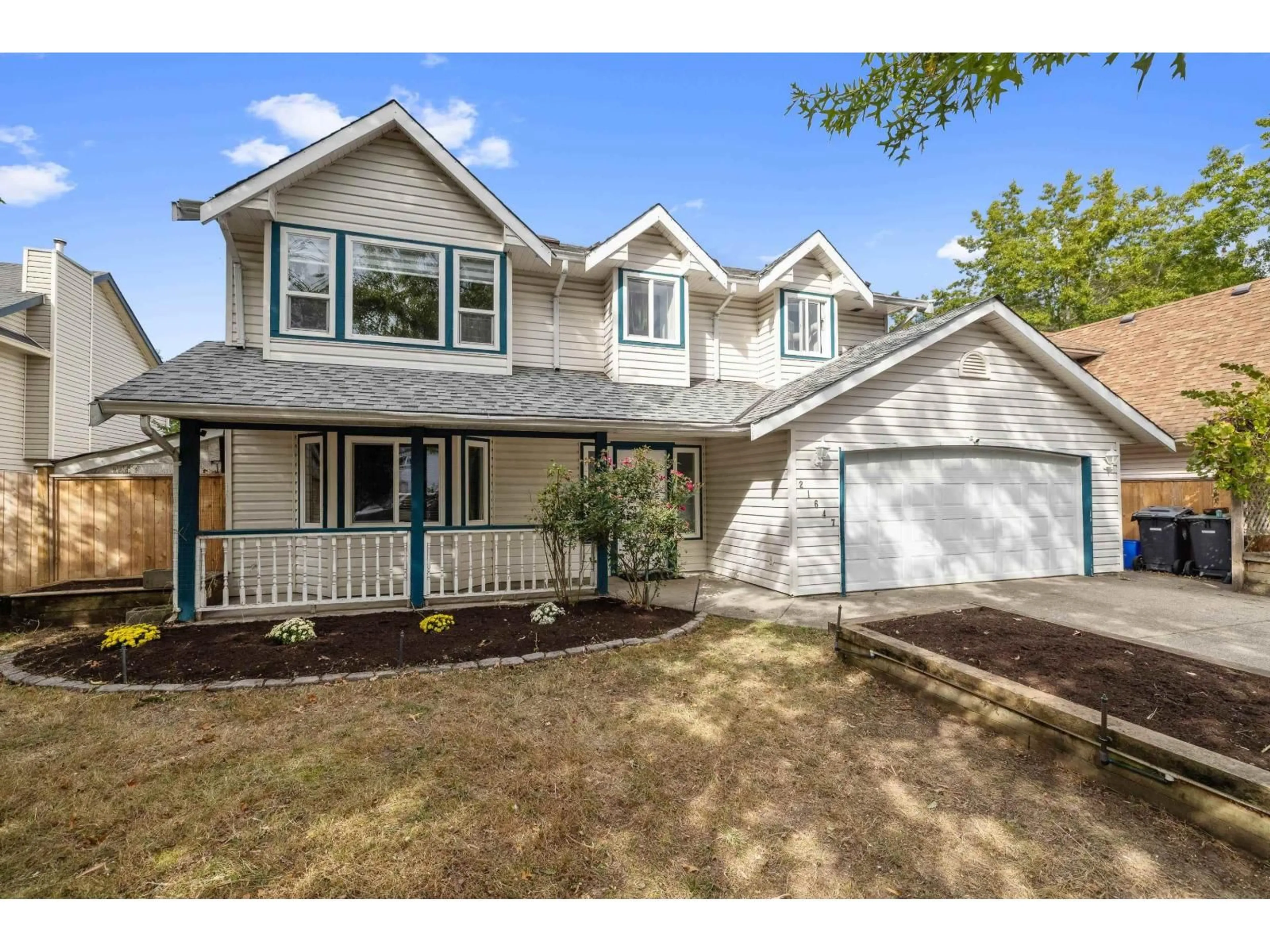 Home with vinyl exterior material, street for 21647 50A AVENUE, Langley British Columbia V3A8W9