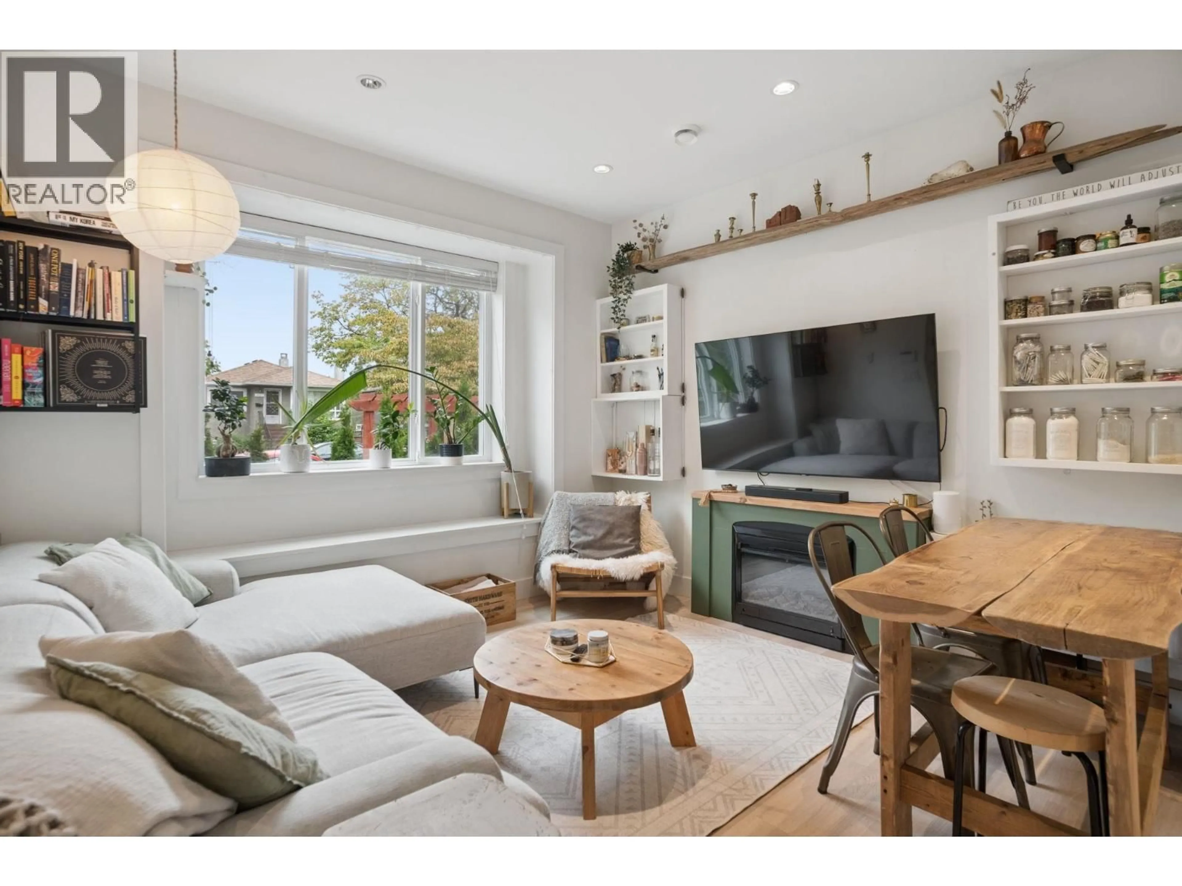 Living room with furniture, wood/laminate floor for 1604 36TH AVENUE, Vancouver British Columbia V5P1C4