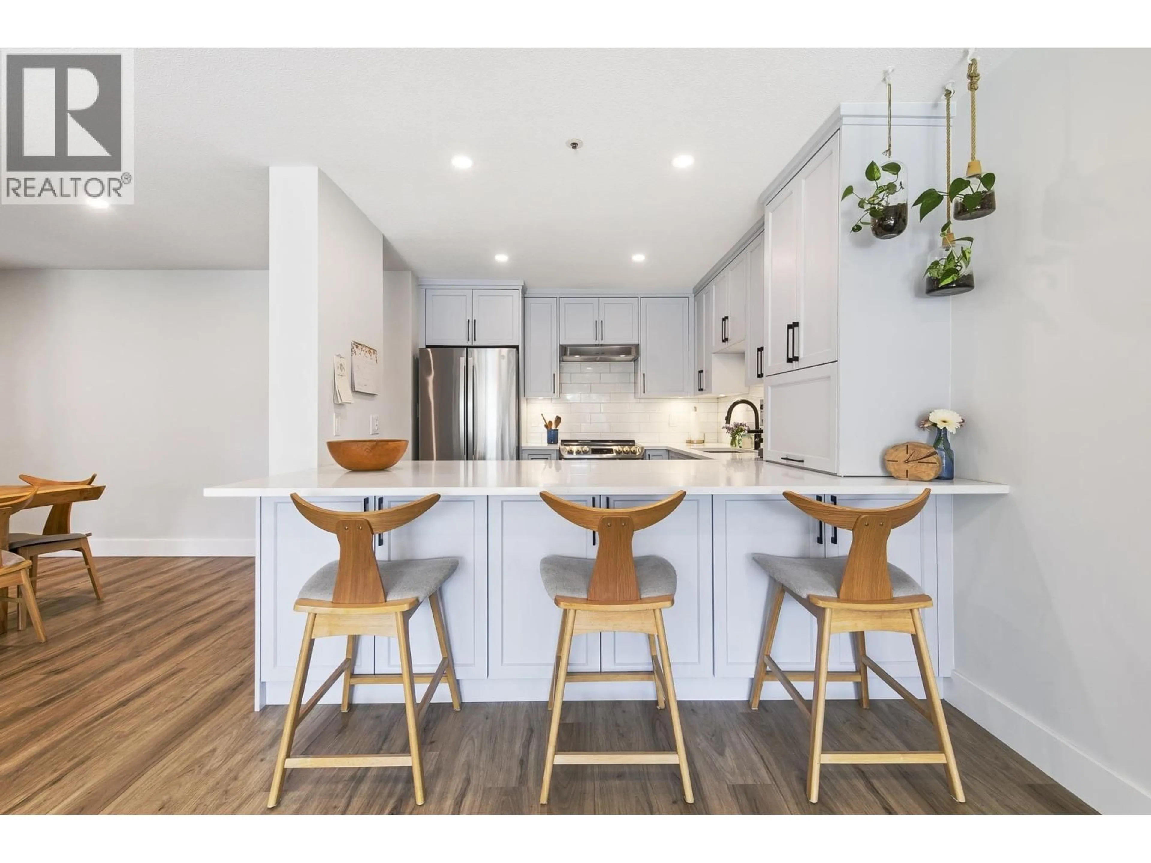 Open concept kitchen, wood/laminate floor for 108 - 3131 MAIN STREET, Vancouver British Columbia V5T3G8