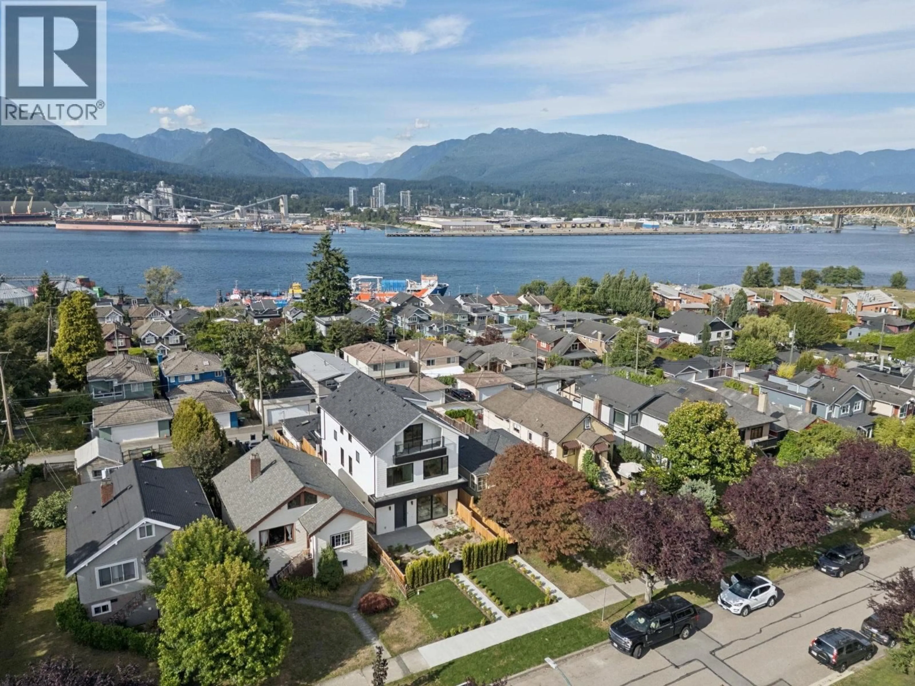A pic from outside/outdoor area/front of a property/back of a property/a pic from drone, water/lake/river/ocean view for 1 - 2815 TRINITY STREET, Vancouver British Columbia V5K1E8