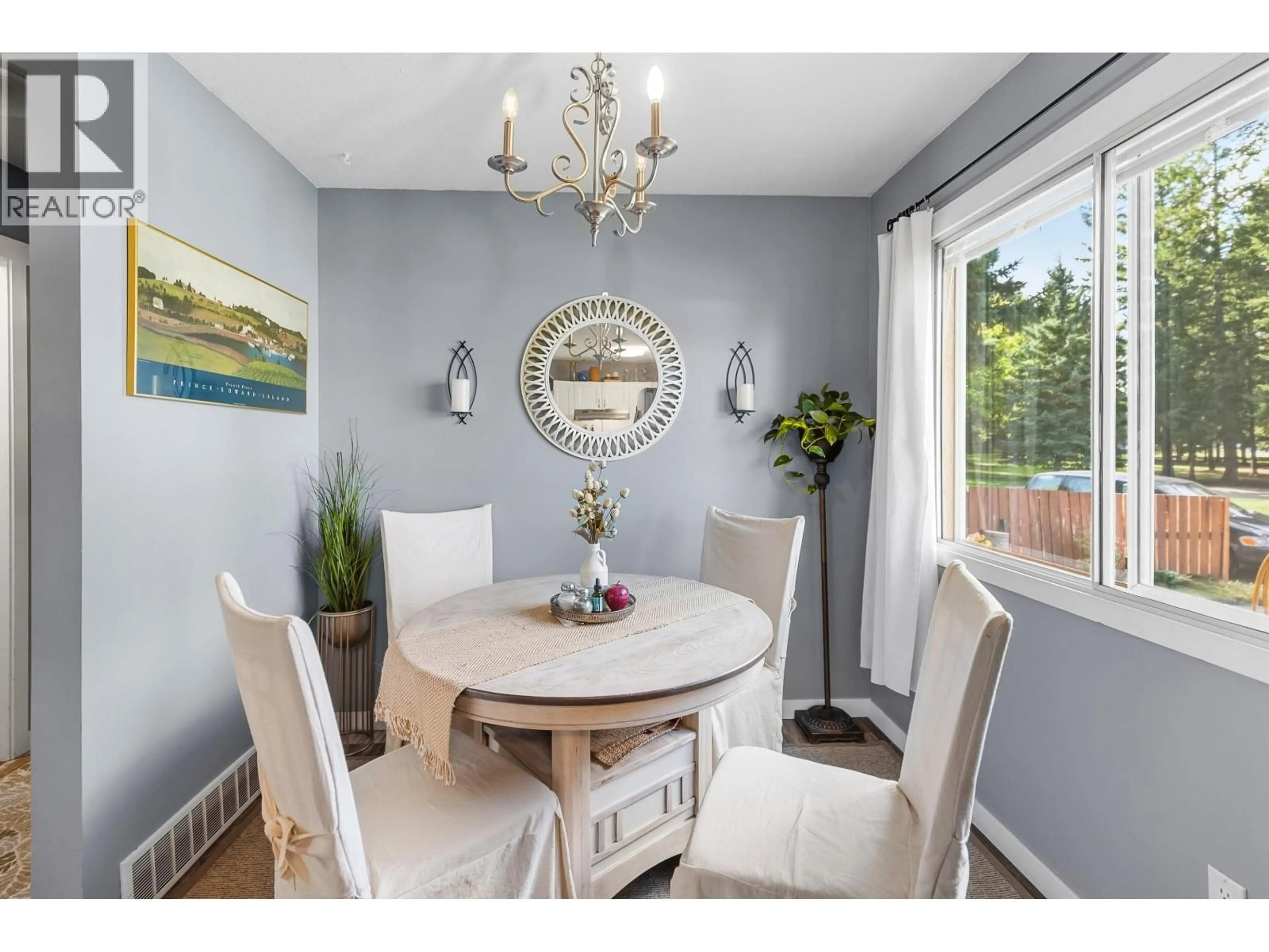 Dining room, wood/laminate floor for 7670 MCMASTER PLACE, Prince George British Columbia V2N3K9