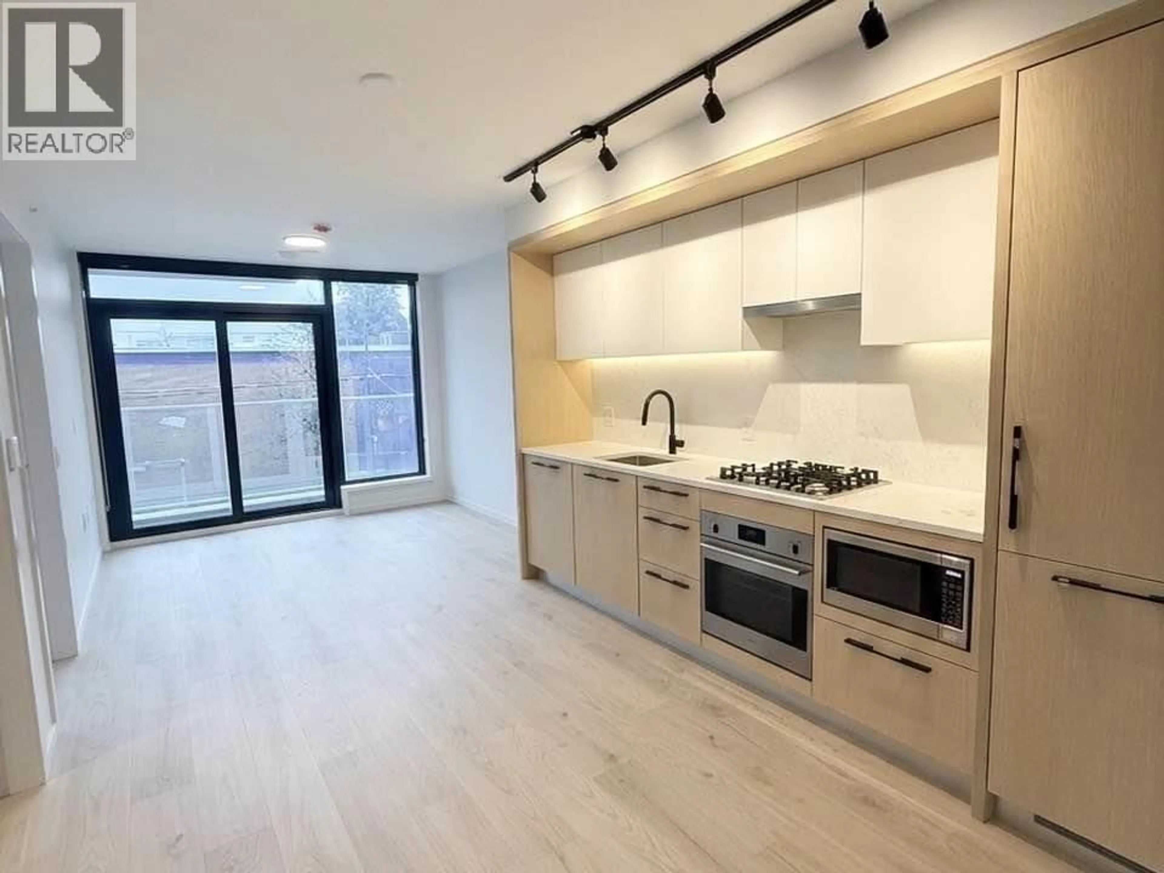 Open concept kitchen, unknown for 261 - 5189 EARLES STREET, Vancouver British Columbia V5R5H4
