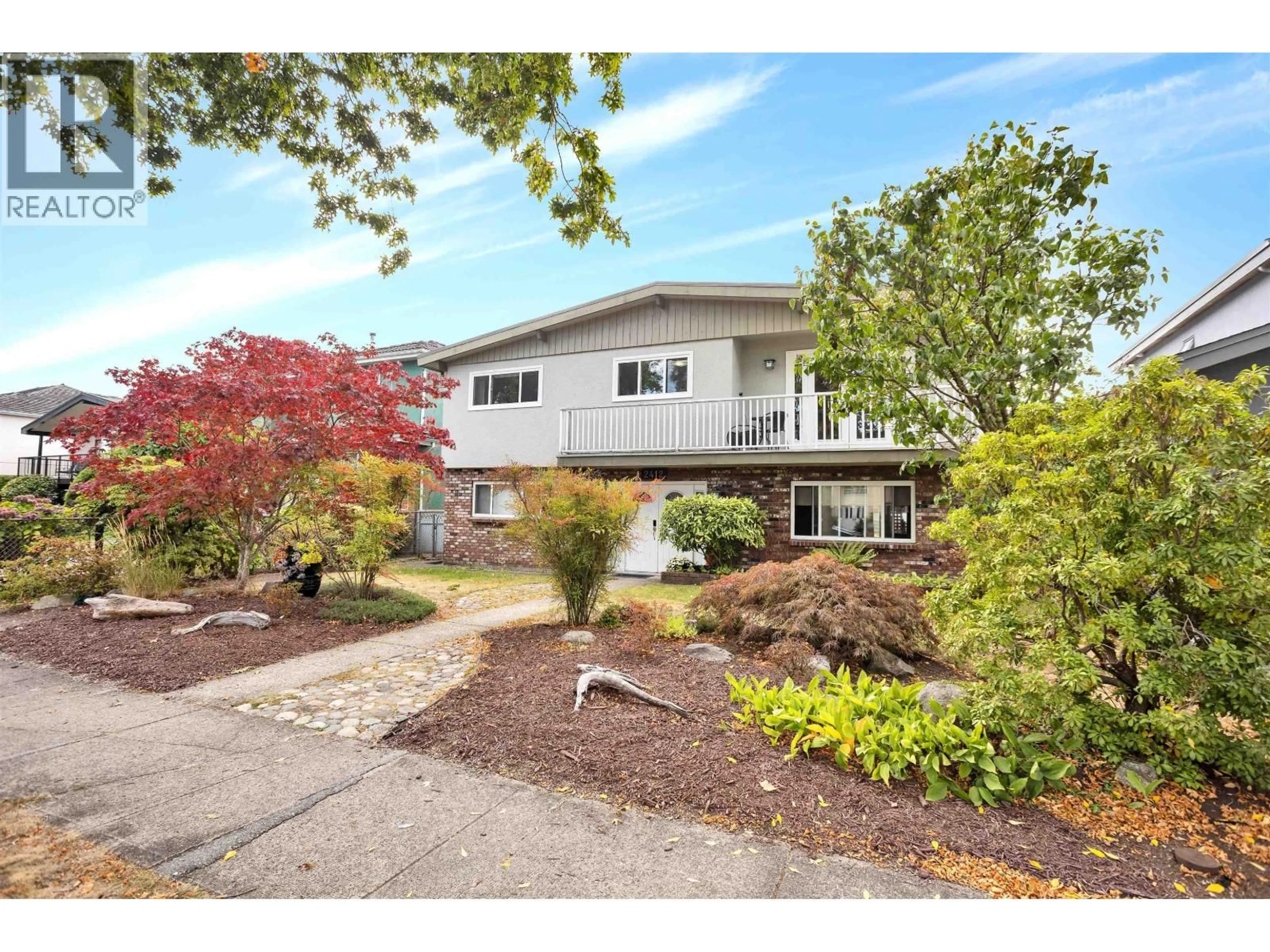 Home with vinyl exterior material, street for 2412 40TH AVENUE, Vancouver British Columbia V5R2V7