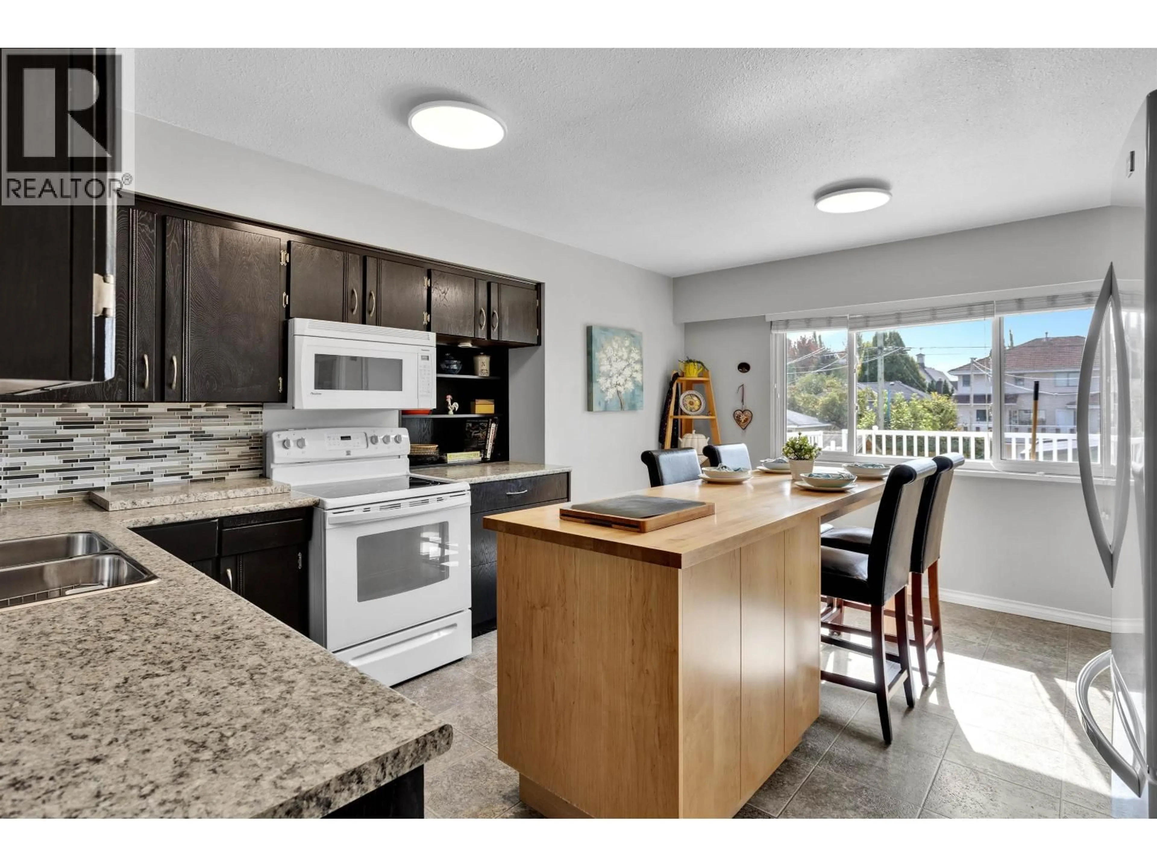 Open concept kitchen, unknown for 2412 40TH AVENUE, Vancouver British Columbia V5R2V7
