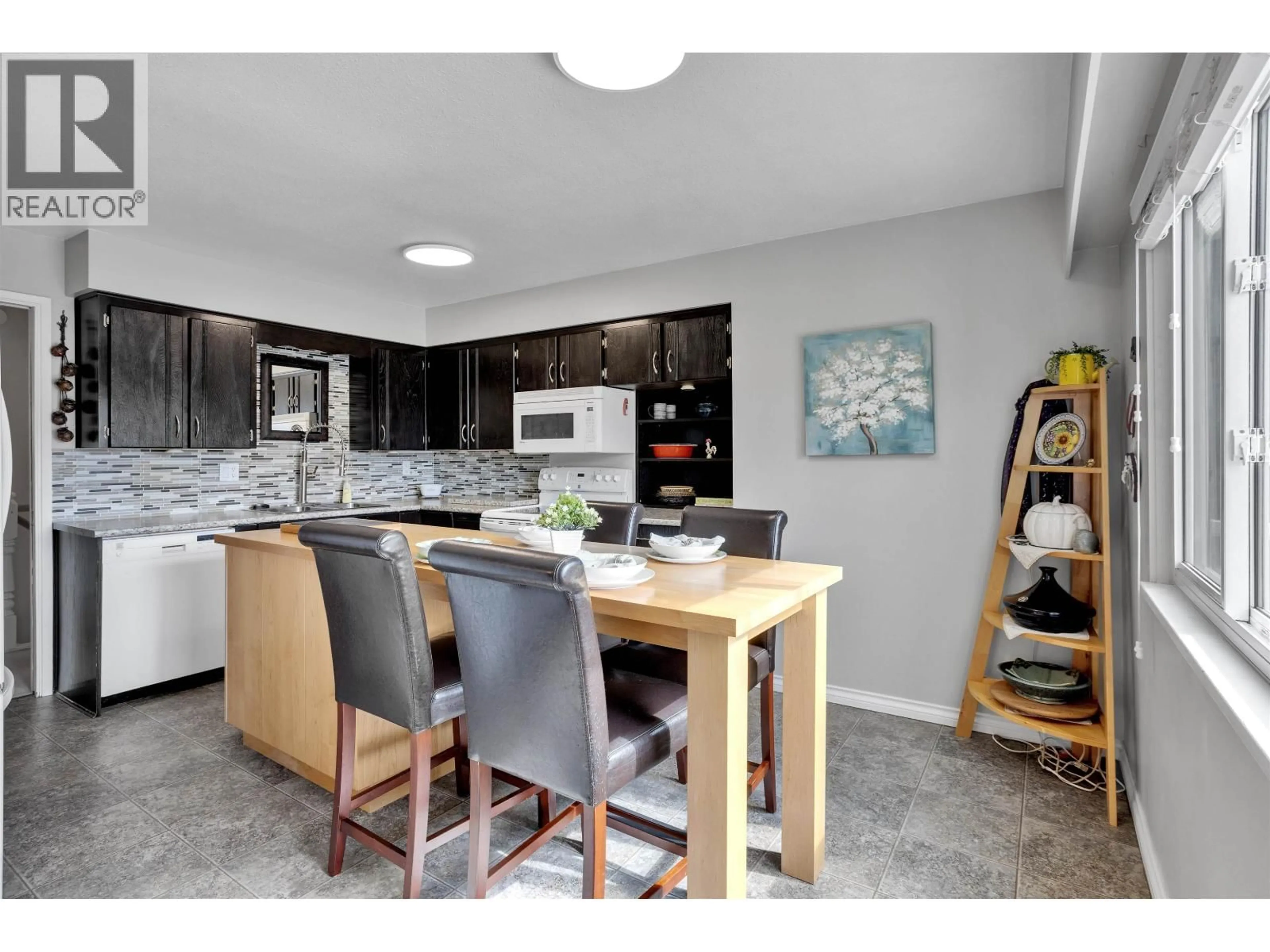 Open concept kitchen, ceramic/tile floor for 2412 40TH AVENUE, Vancouver British Columbia V5R2V7