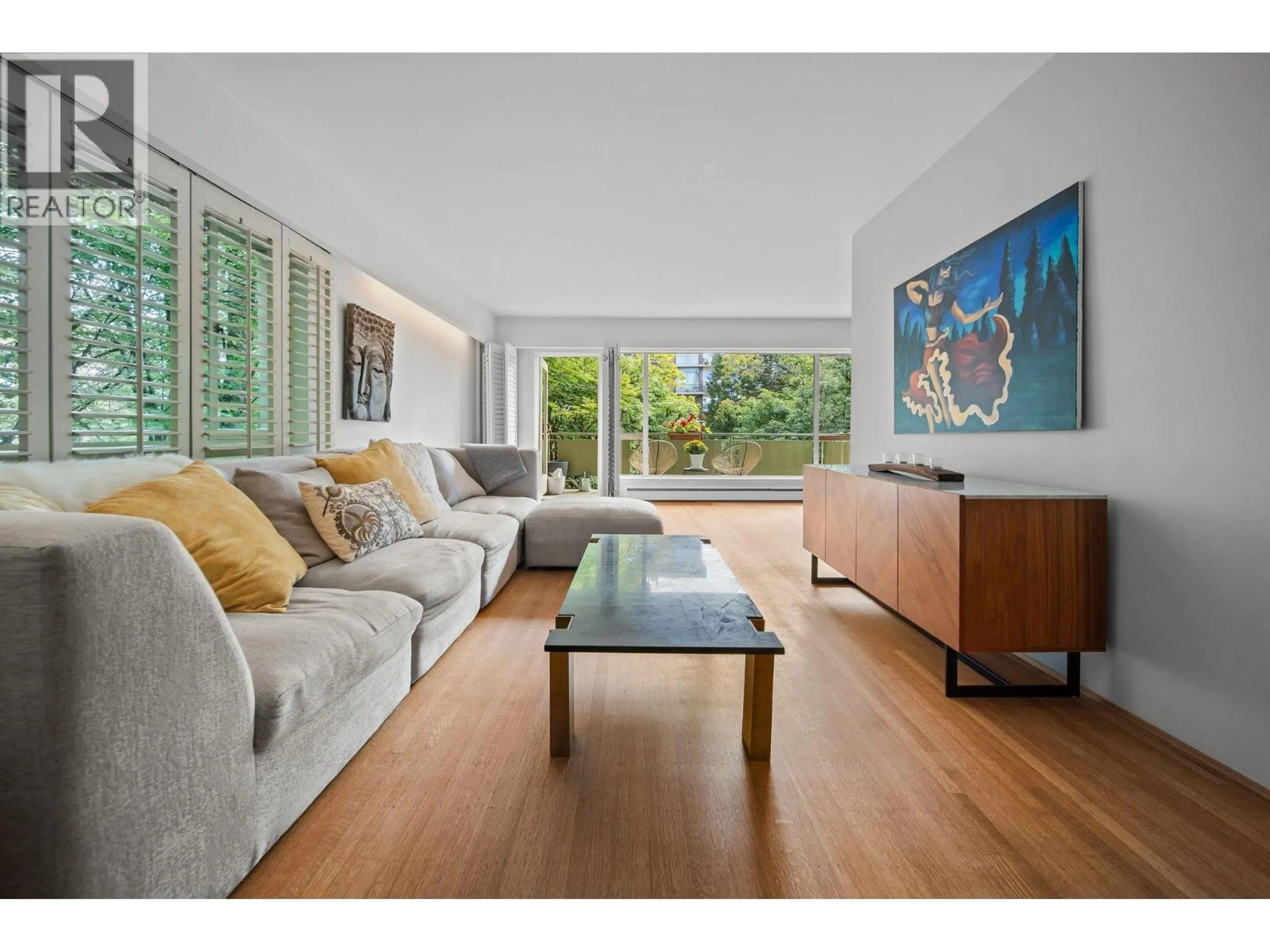 Living room with furniture, wood/laminate floor for 204 - 5475 VINE STREET, Vancouver British Columbia V6M3Z7
