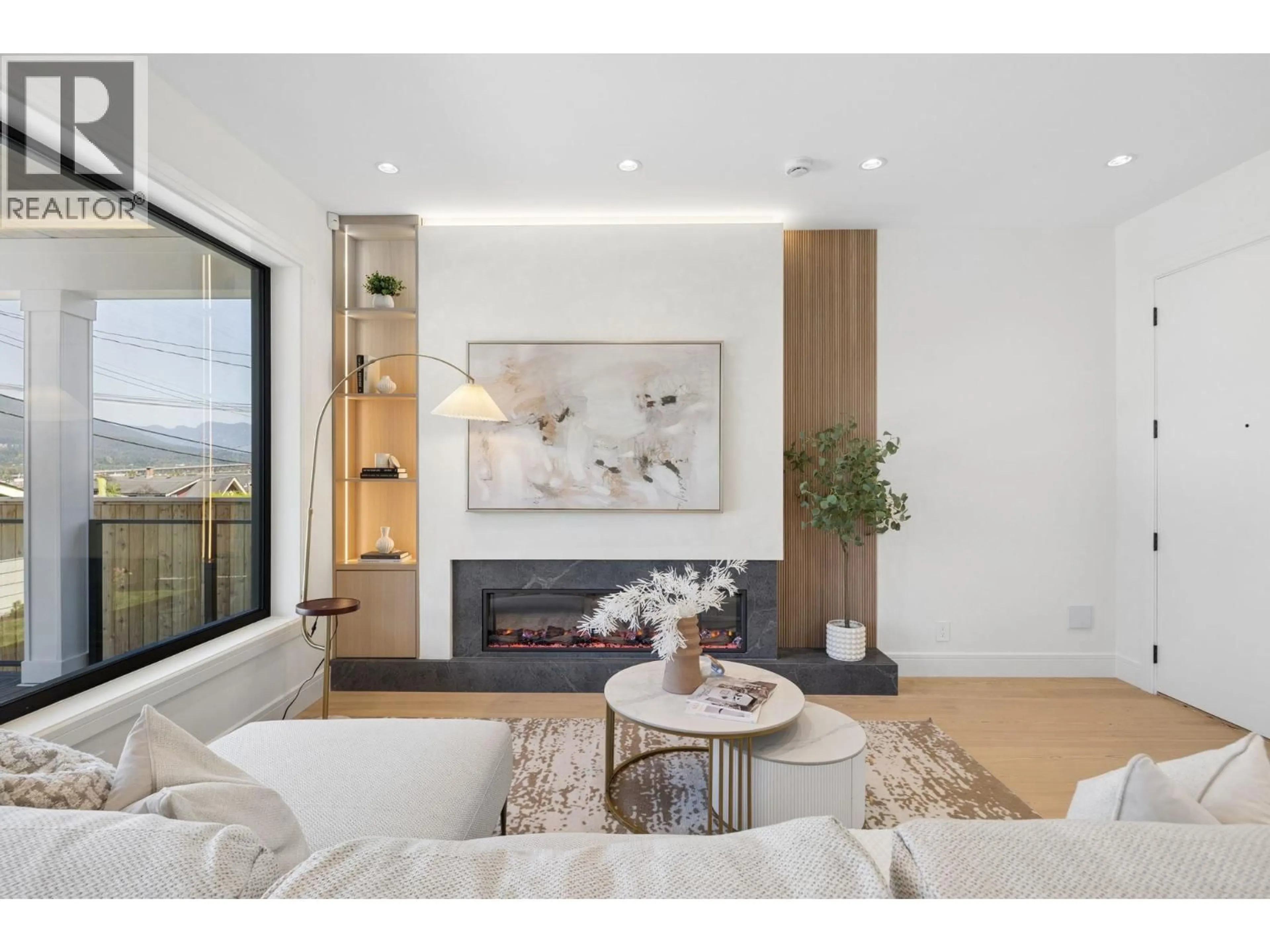 Living room with furniture, wood/laminate floor for 2 - 2815 TRINITY STREET, Vancouver British Columbia V5K1E8