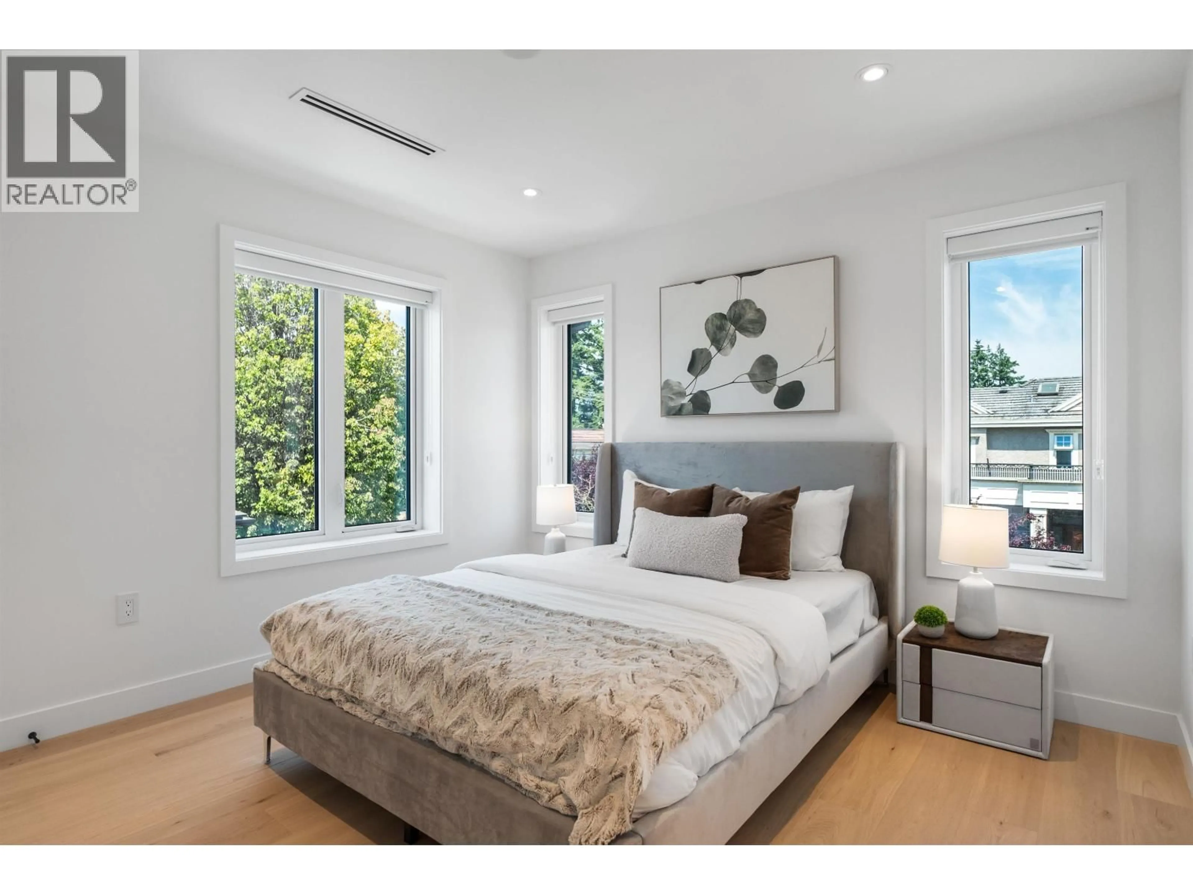 Bedroom with bed, wood/laminate floor for 1010 52ND AVENUE, Vancouver British Columbia V6P1H5