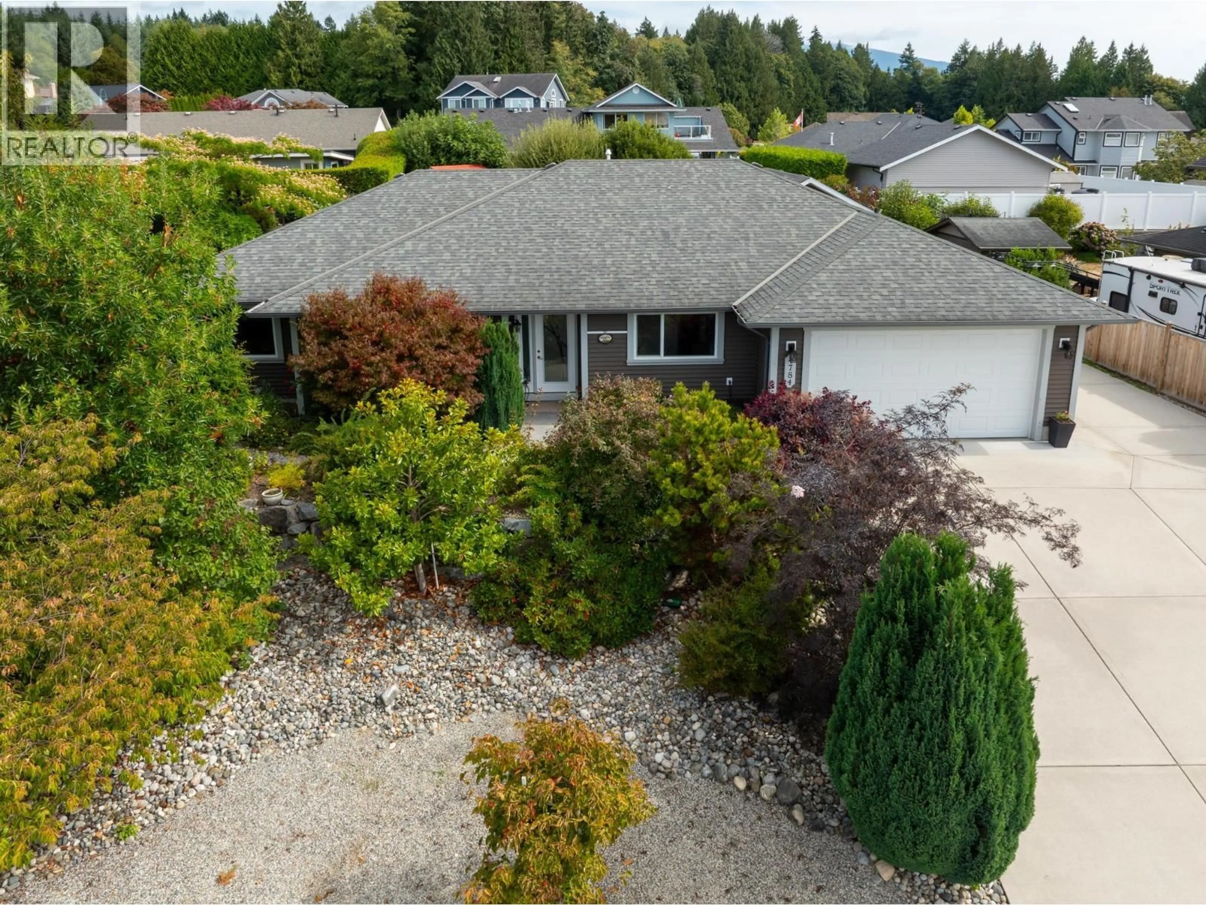 A pic from outside/outdoor area/front of a property/back of a property/a pic from drone, street for 4784 TAMARACK PLACE, Sechelt British Columbia V7Z0E8