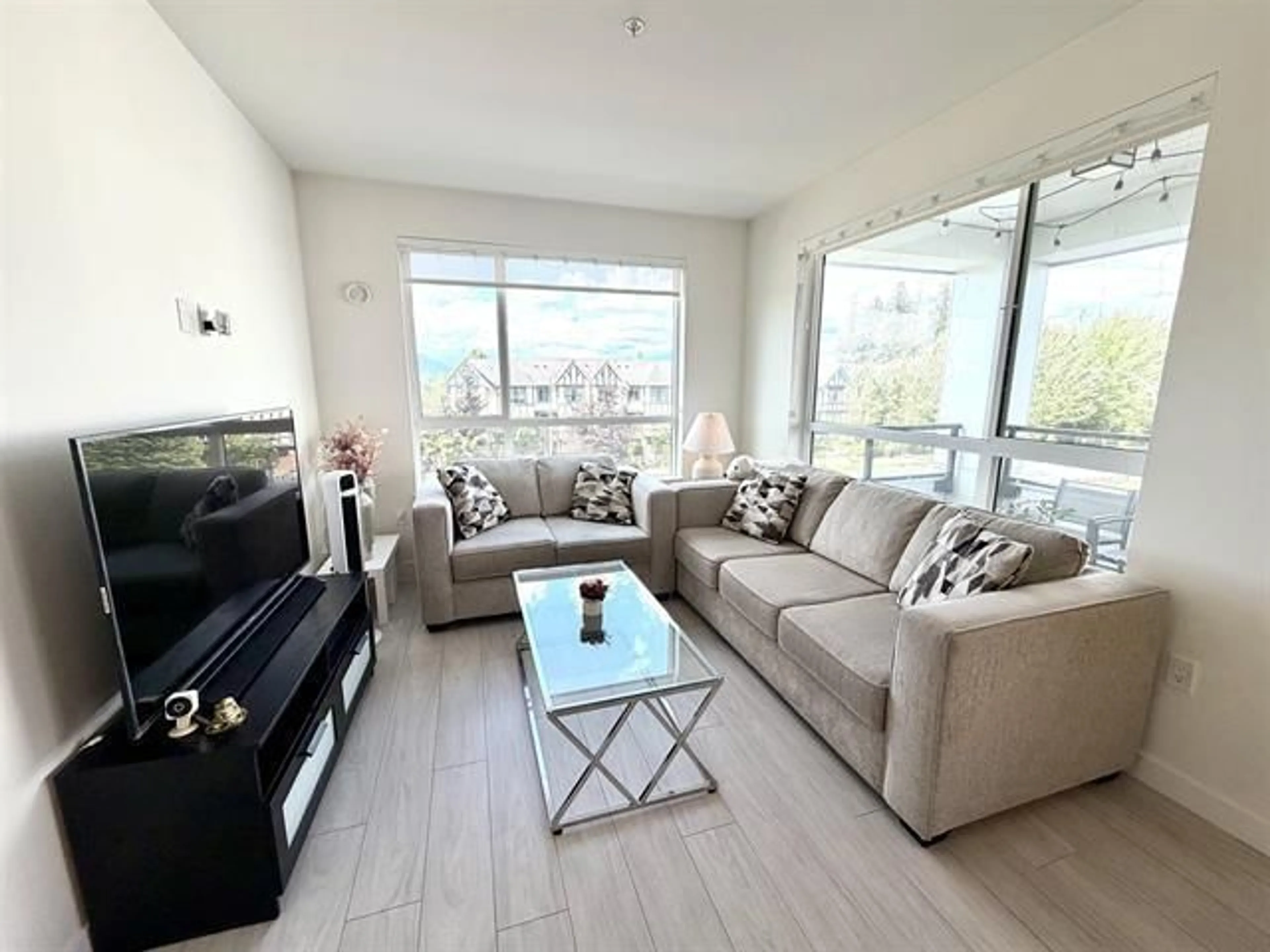 Living room with furniture, unknown for B316 - 20834 80 AVENUE, Langley British Columbia V2Y3M6