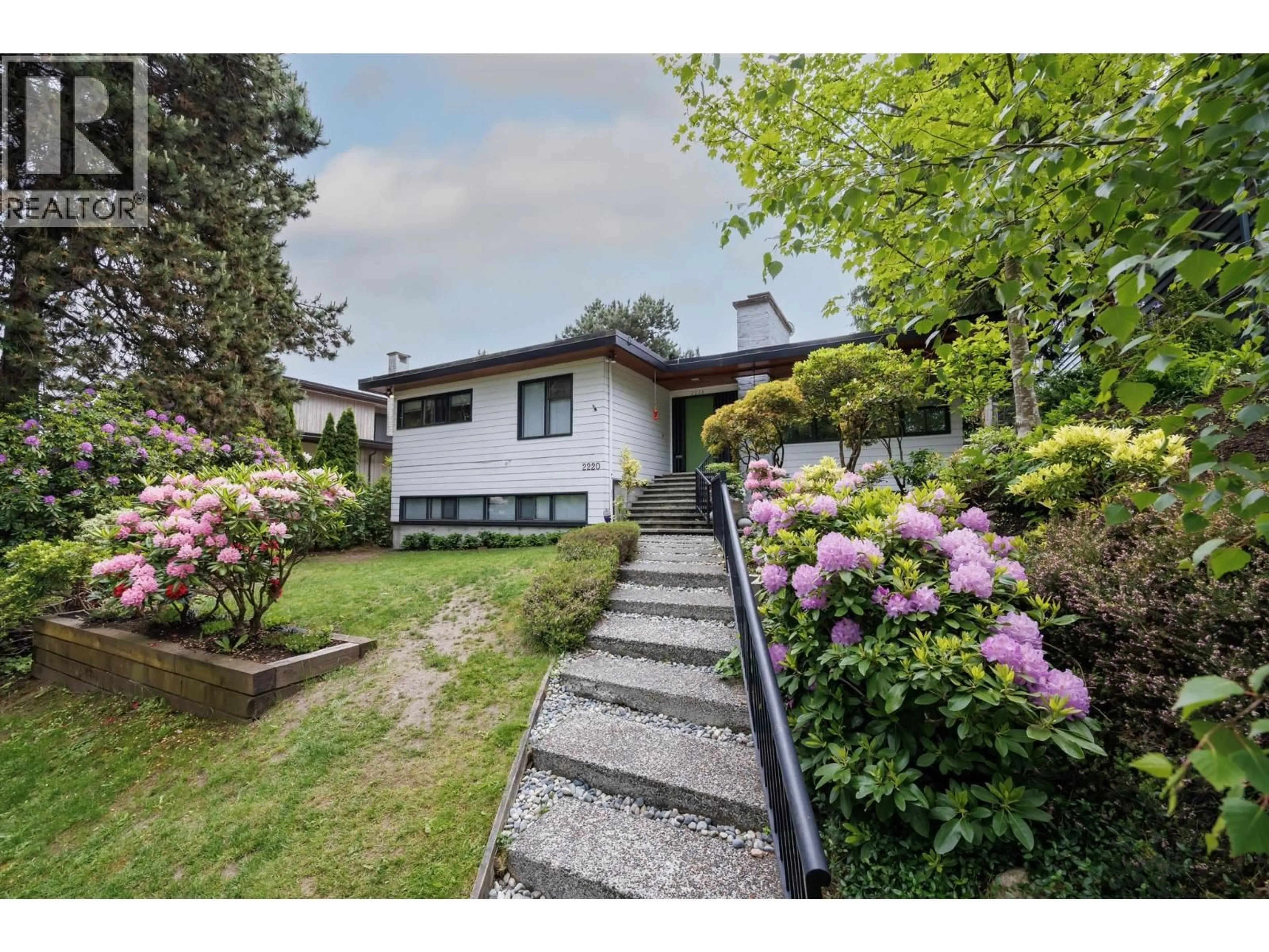 A pic from outside/outdoor area/front of a property/back of a property/a pic from drone, street for 2220 32ND AVENUE, Vancouver British Columbia V6L2B2