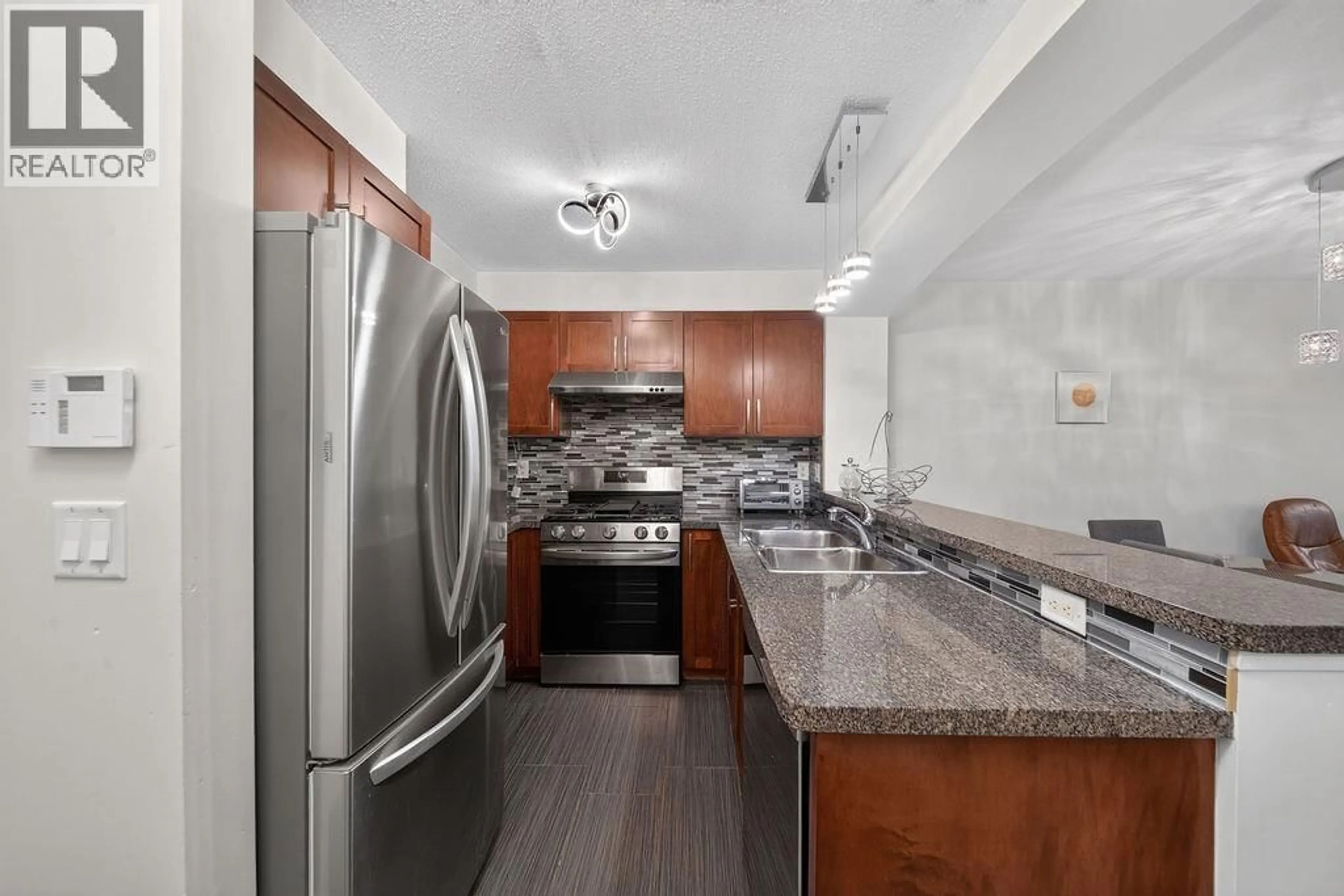 Standard kitchen, ceramic/tile floor for 105 - 5740 TORONTO ROAD, Vancouver British Columbia V6T1L2