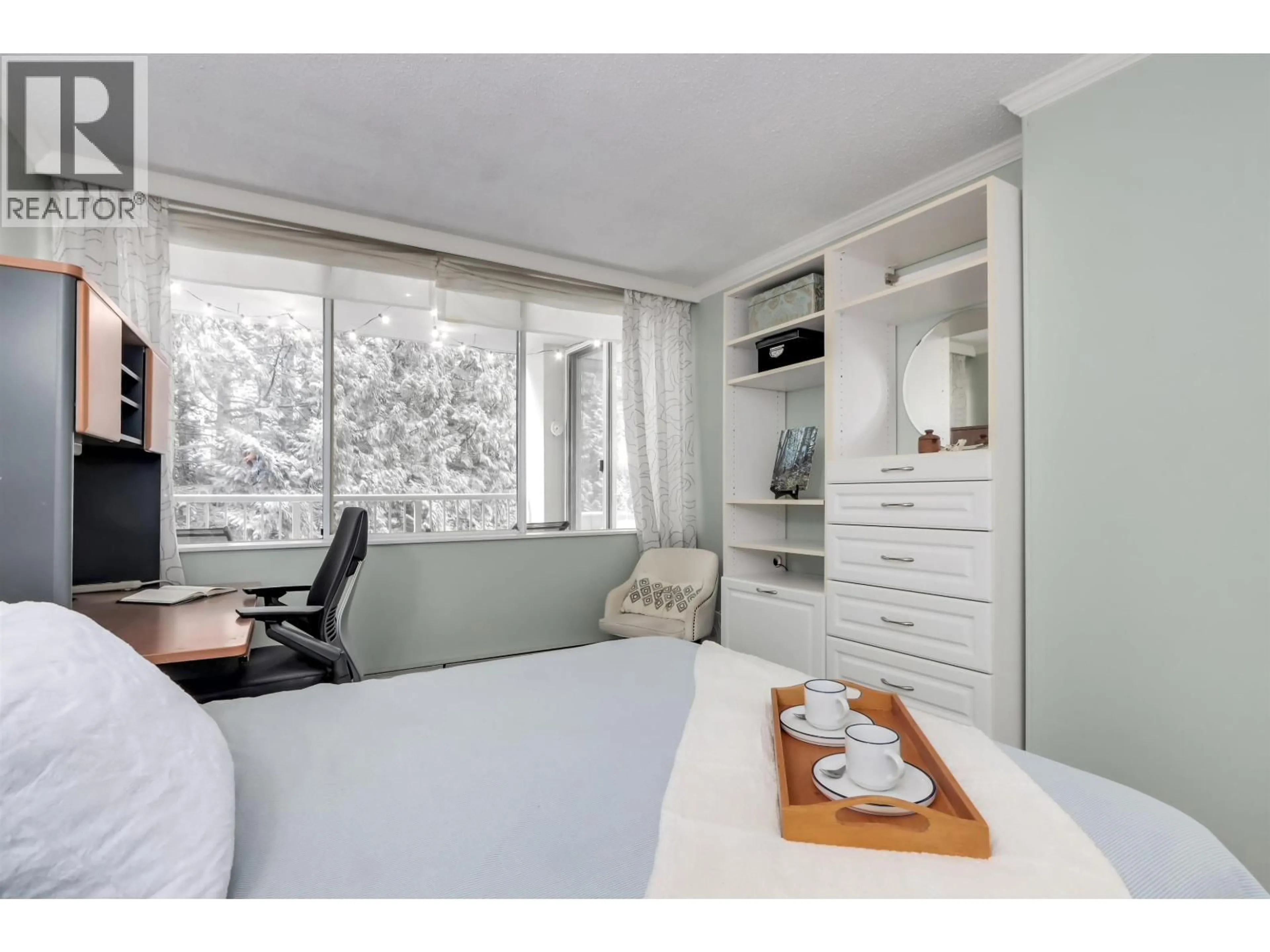 Bedroom with bed, wood/laminate floor for 303 - 2004 FULLERTON AVENUE, North Vancouver British Columbia V7P3G8