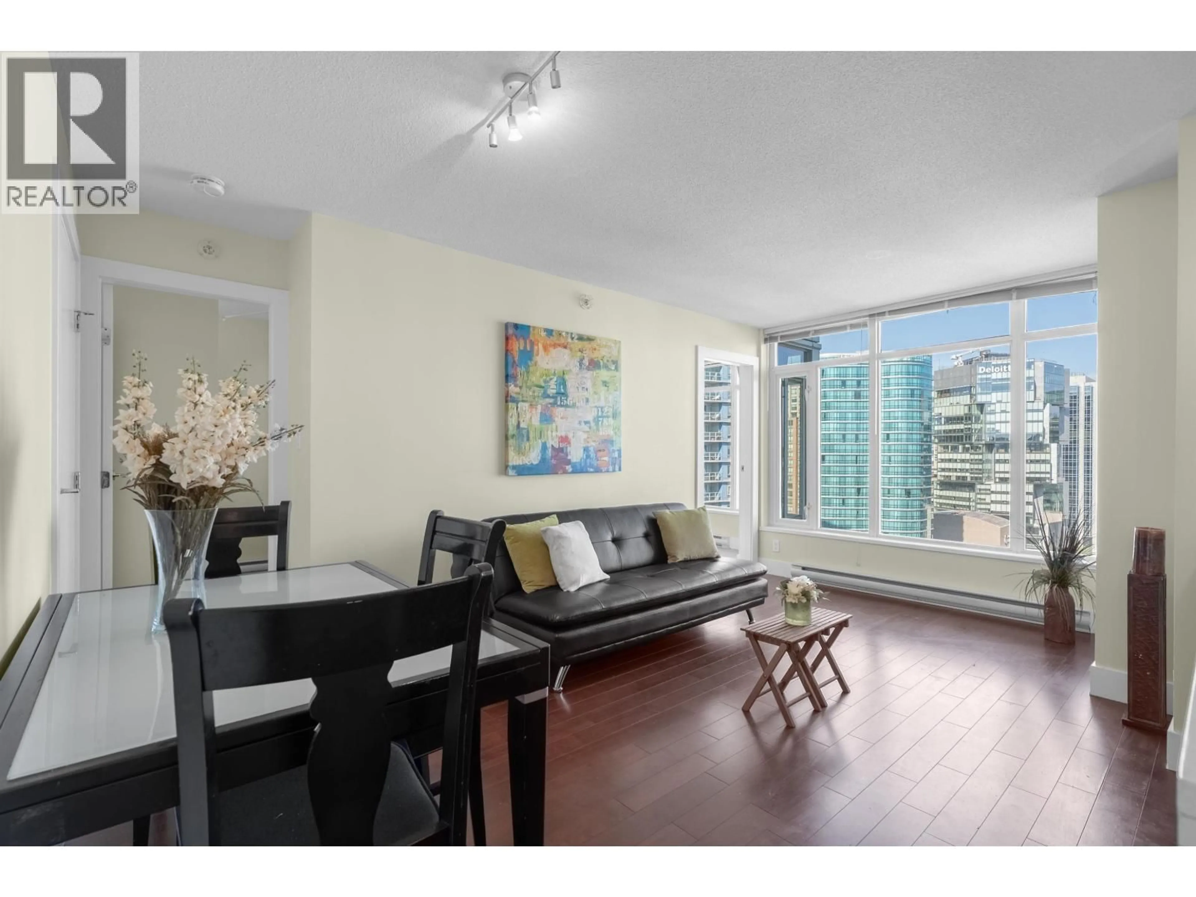Living room with furniture, wood/laminate floor for 2504 - 888 HOMER STREET, Vancouver British Columbia V6B0H7