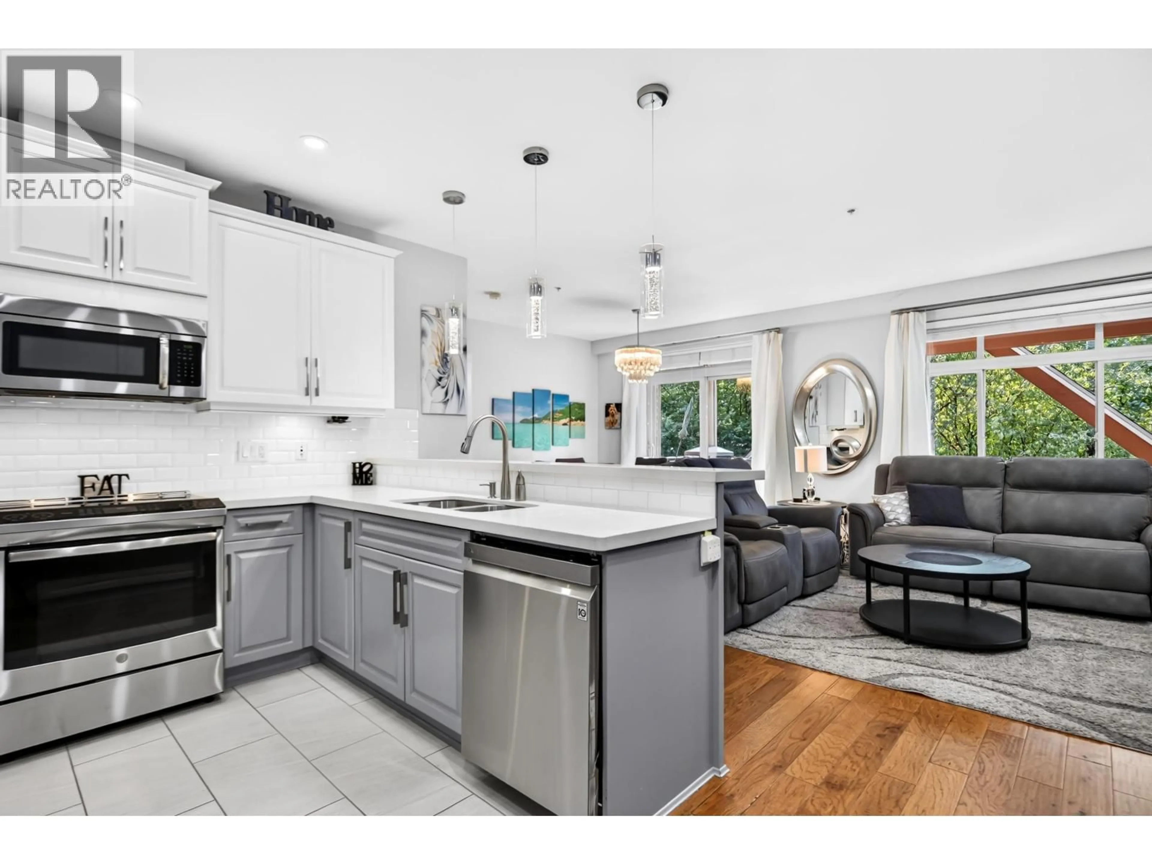 Open concept kitchen, ceramic/tile floor for 208 - 12565 190A STREET, Pitt Meadows British Columbia V3Y0E1