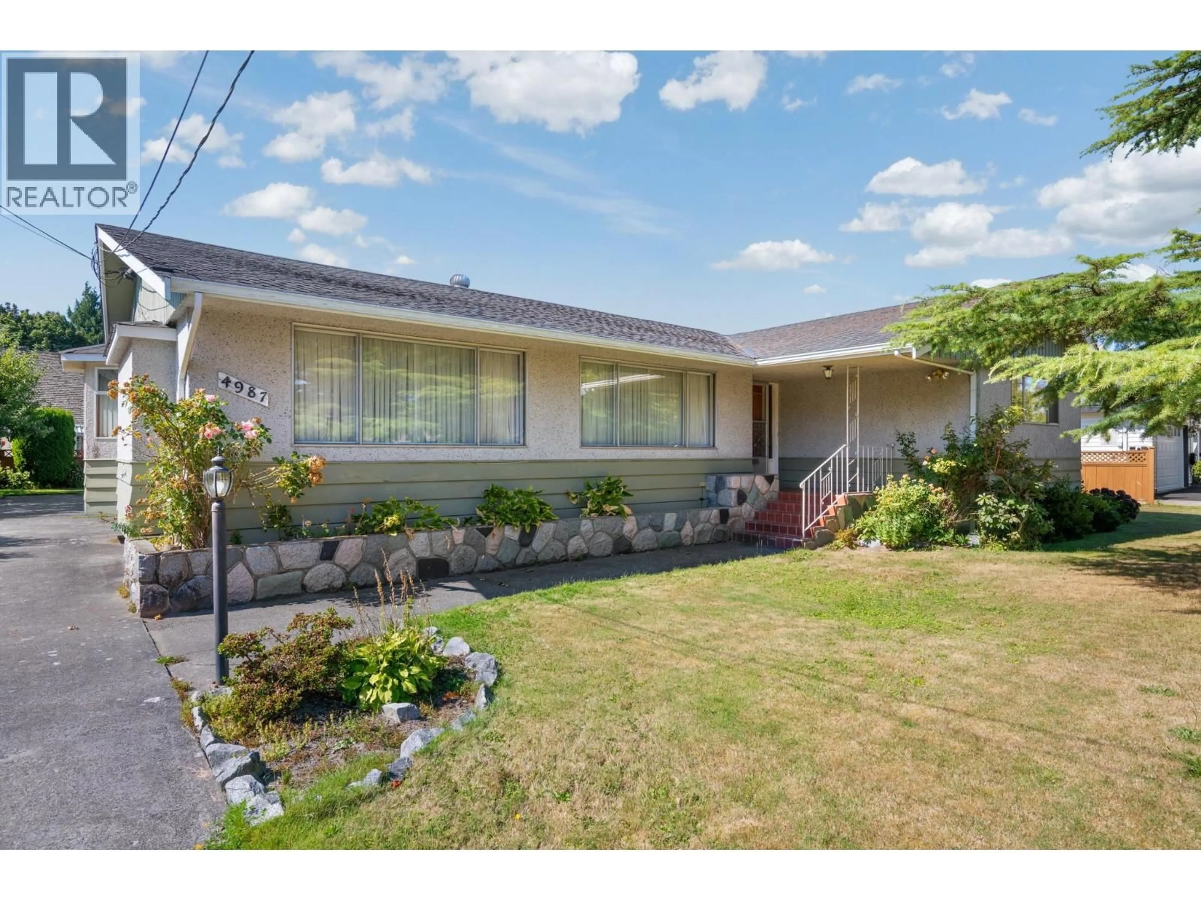 Home with vinyl exterior material, street for 4987 WESTMINSTER AVENUE, Delta British Columbia V4K2J1