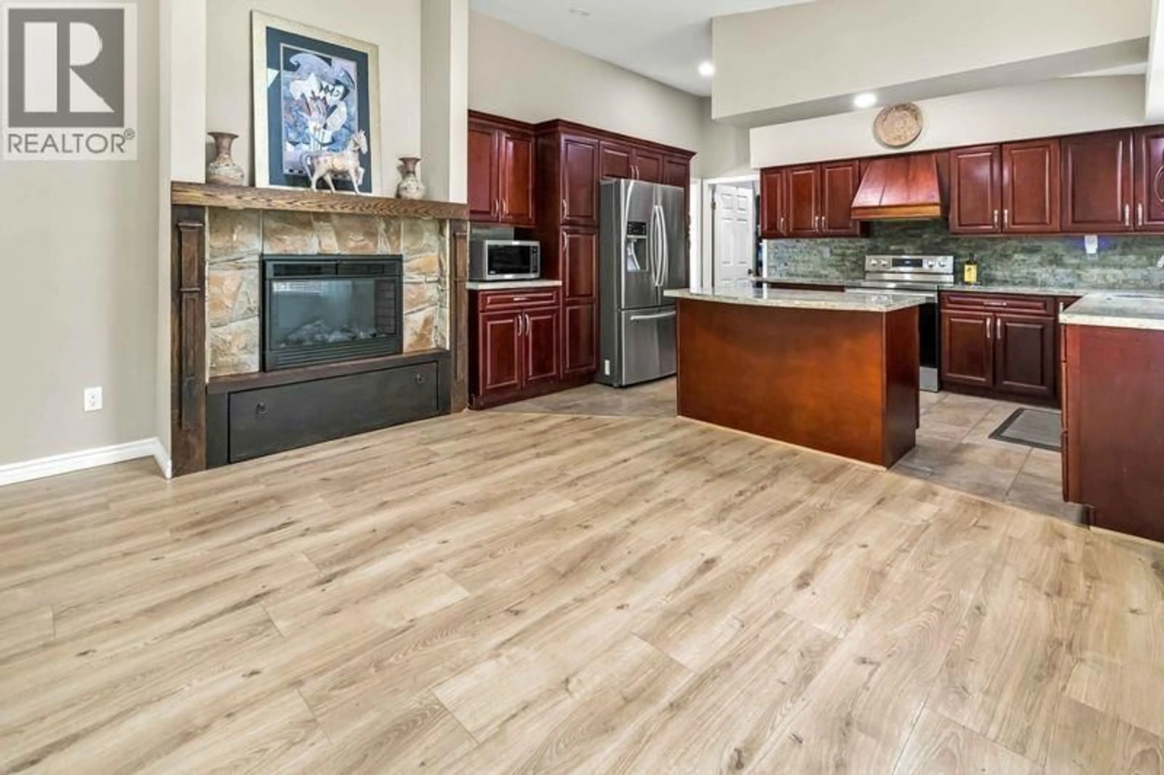 Open concept kitchen, wood/laminate floor for 734 CARLETON DRIVE, Port Moody British Columbia V3H3K6