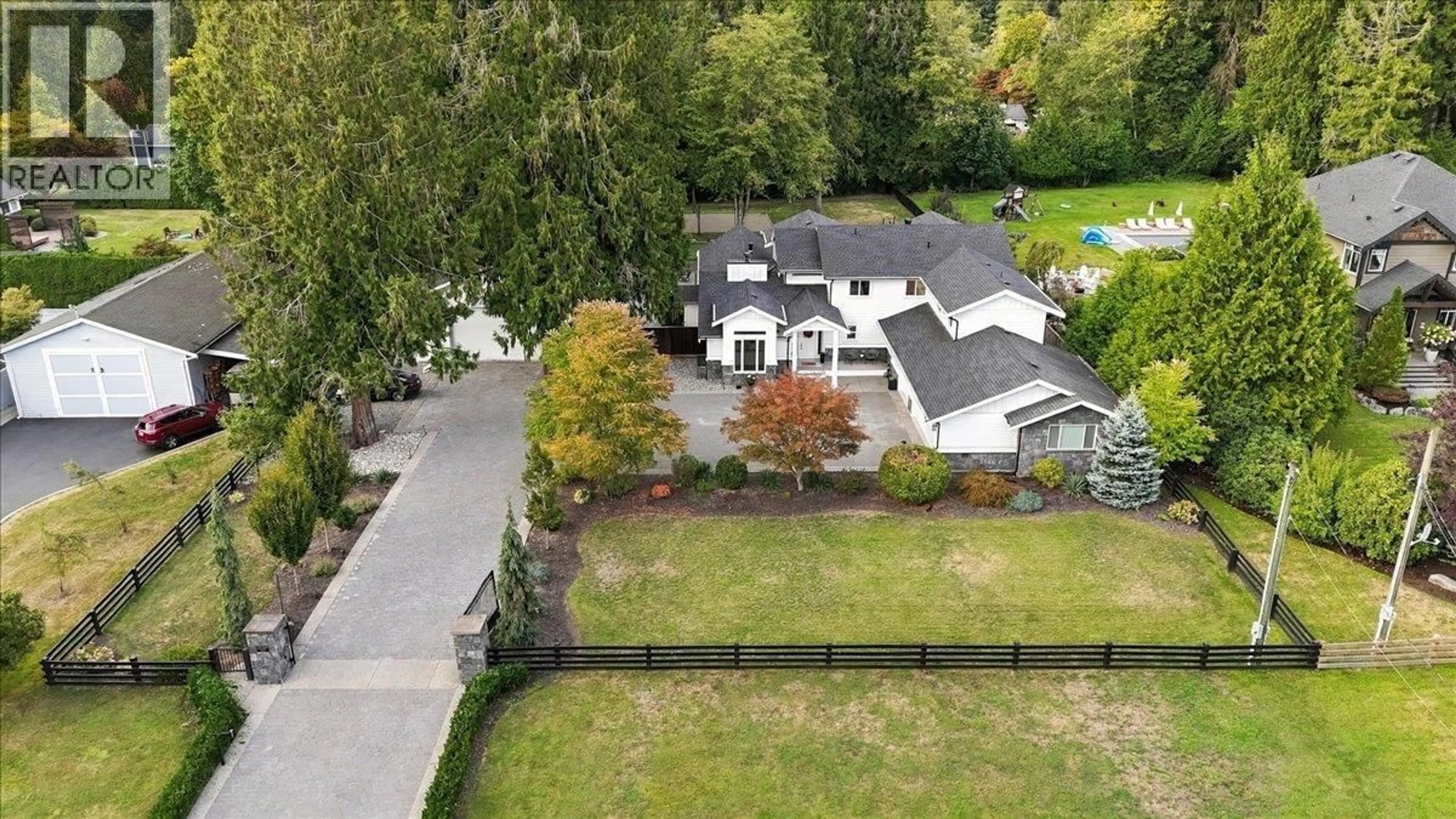 A pic from outside/outdoor area/front of a property/back of a property/a pic from drone, street for 24155 124 AVENUE, Maple Ridge British Columbia V4R1N3