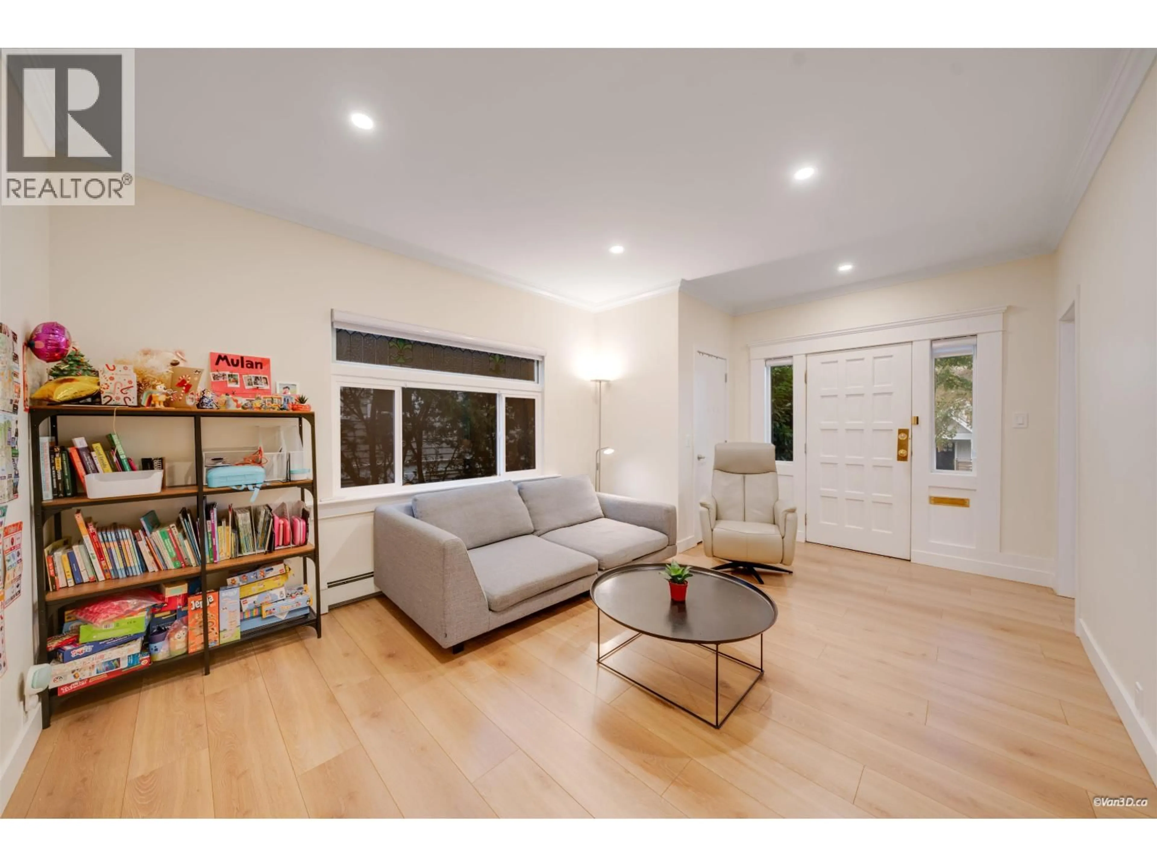 Living room with furniture, wood/laminate floor for 2343 45TH AVENUE, Vancouver British Columbia V6M2J5