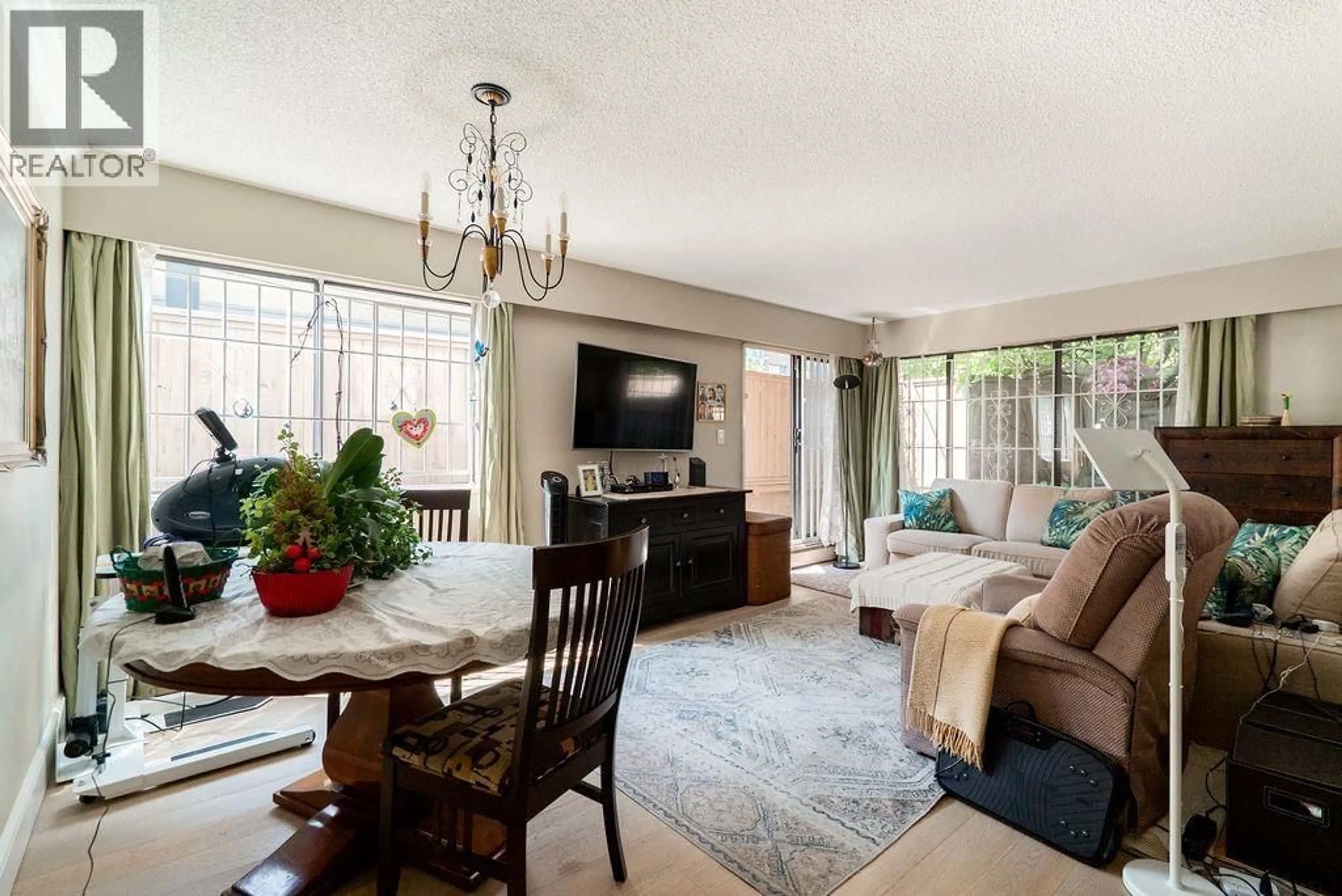 Living room with furniture, unknown for 102 - 2190 8TH AVENUE, Vancouver British Columbia V6K2A4