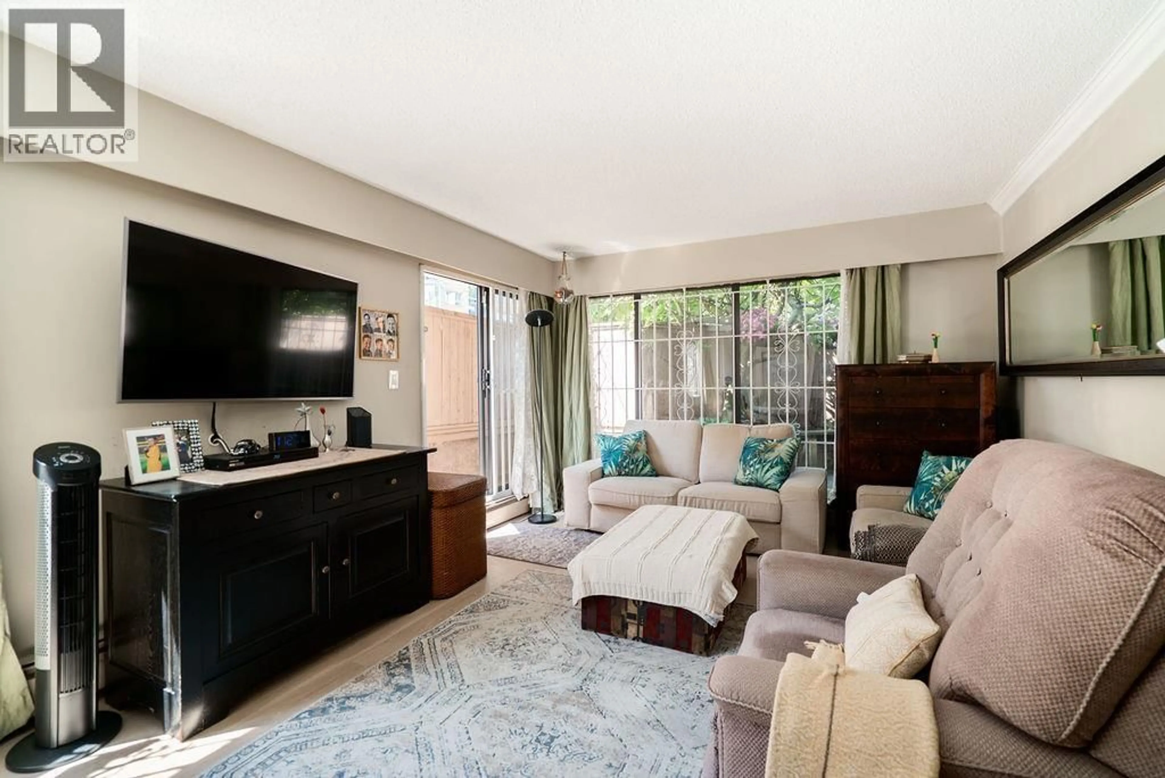 Living room with furniture, unknown for 102 - 2190 8TH AVENUE, Vancouver British Columbia V6K2A4
