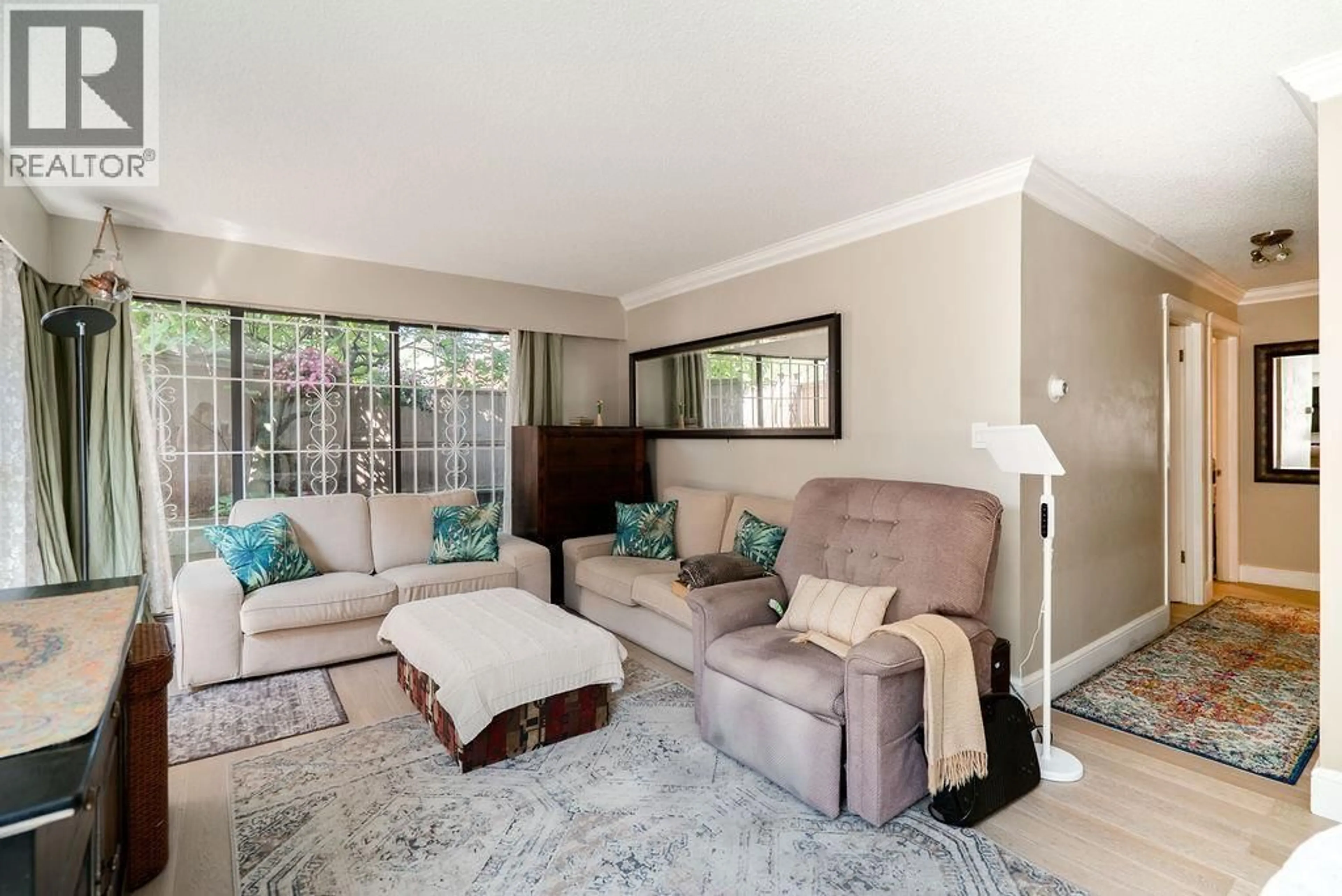 Living room with furniture, unknown for 102 - 2190 8TH AVENUE, Vancouver British Columbia V6K2A4