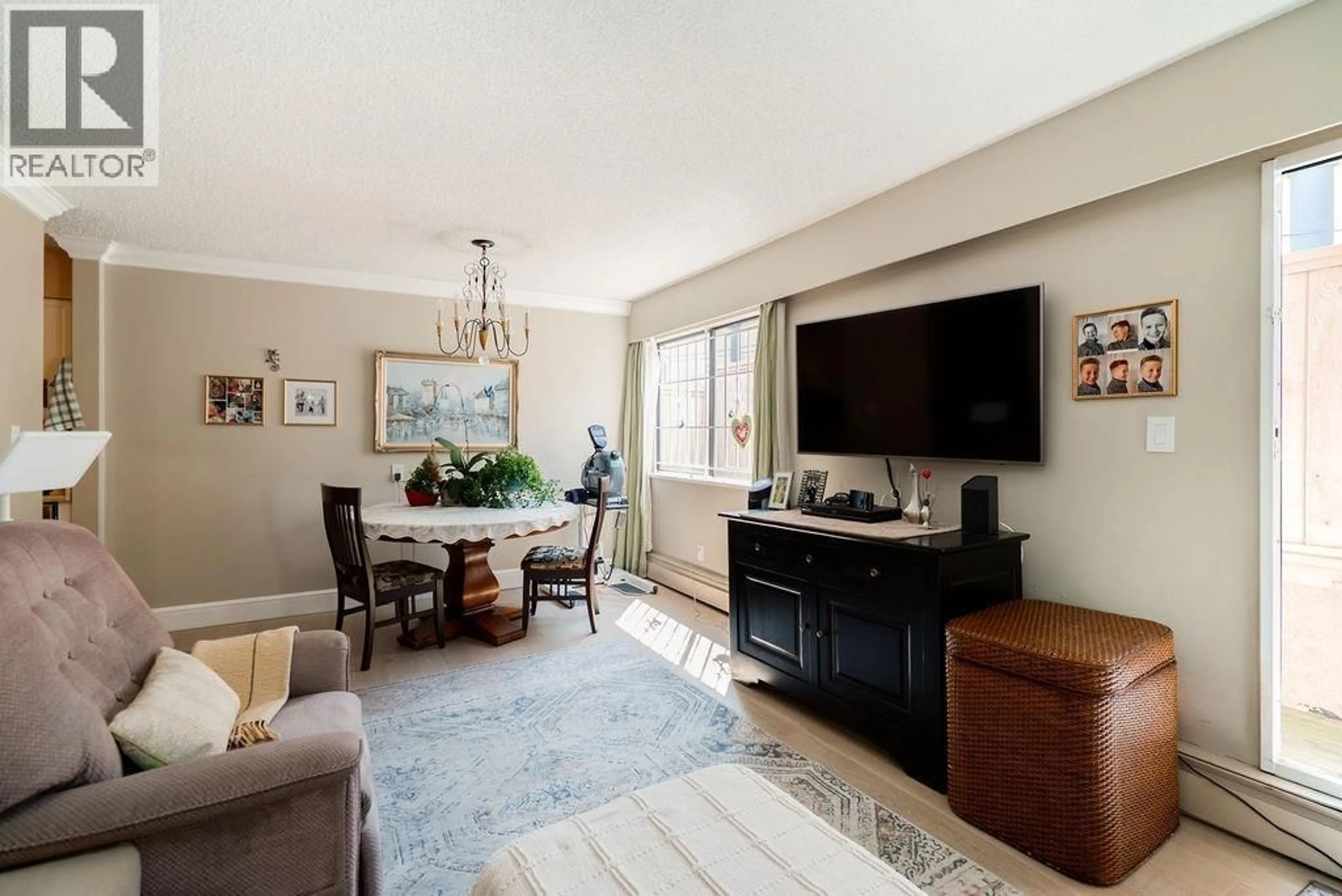 Living room with furniture, unknown for 102 - 2190 8TH AVENUE, Vancouver British Columbia V6K2A4