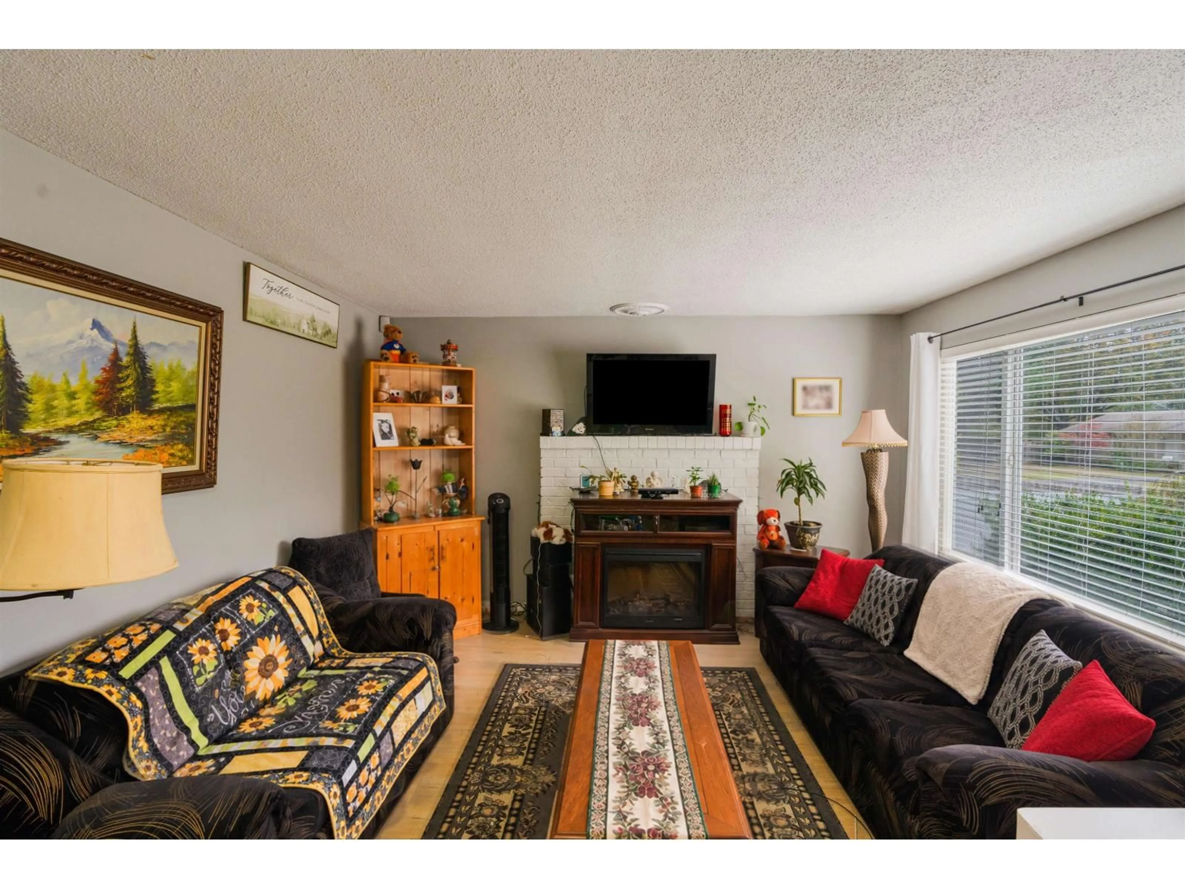Living room with furniture, unknown for 4567 202 STREET, Langley British Columbia V3A6M6