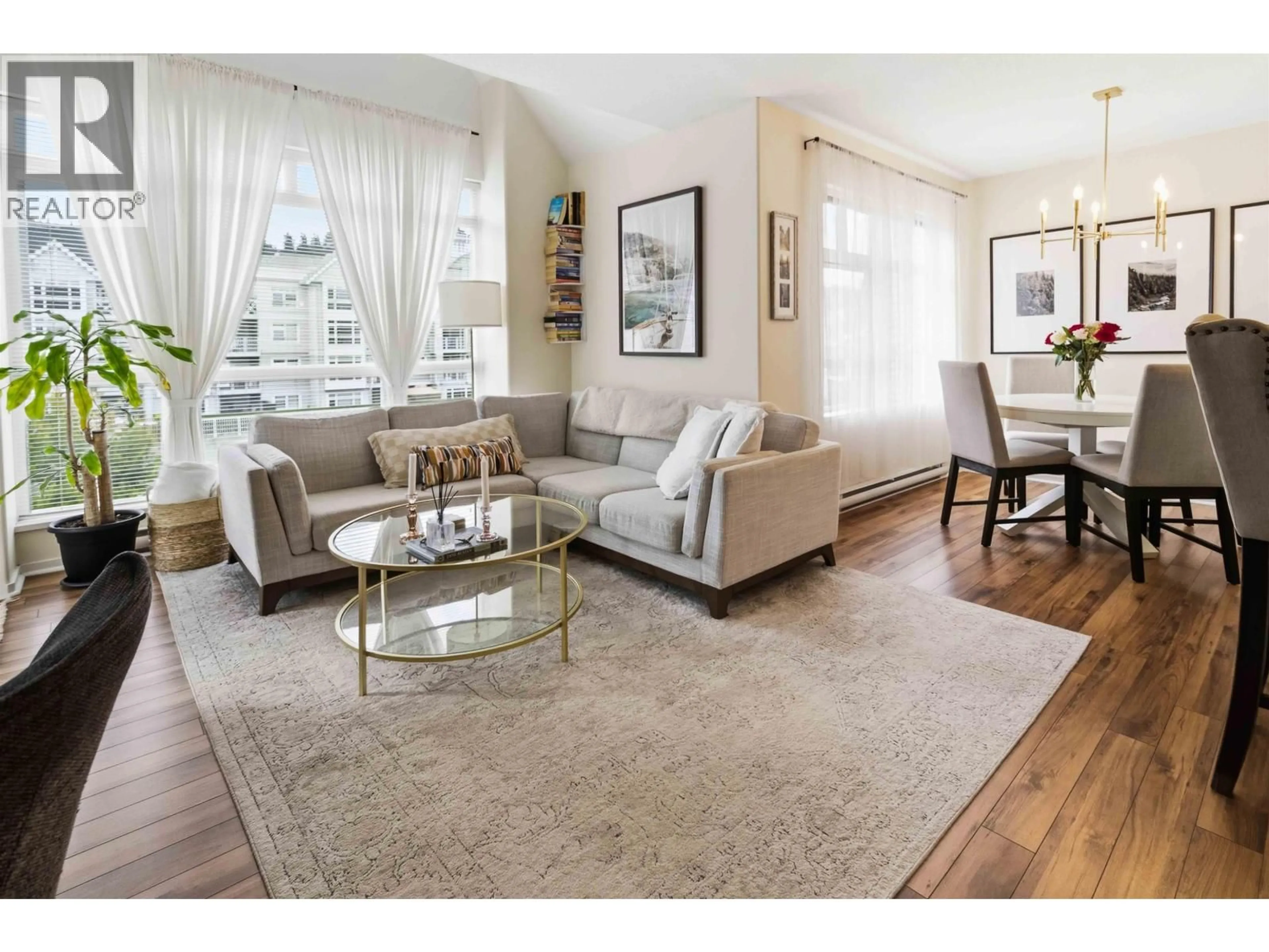Living room with furniture, wood/laminate floor for 401 - 3142 ST JOHNS STREET, Port Moody British Columbia V3H5E5