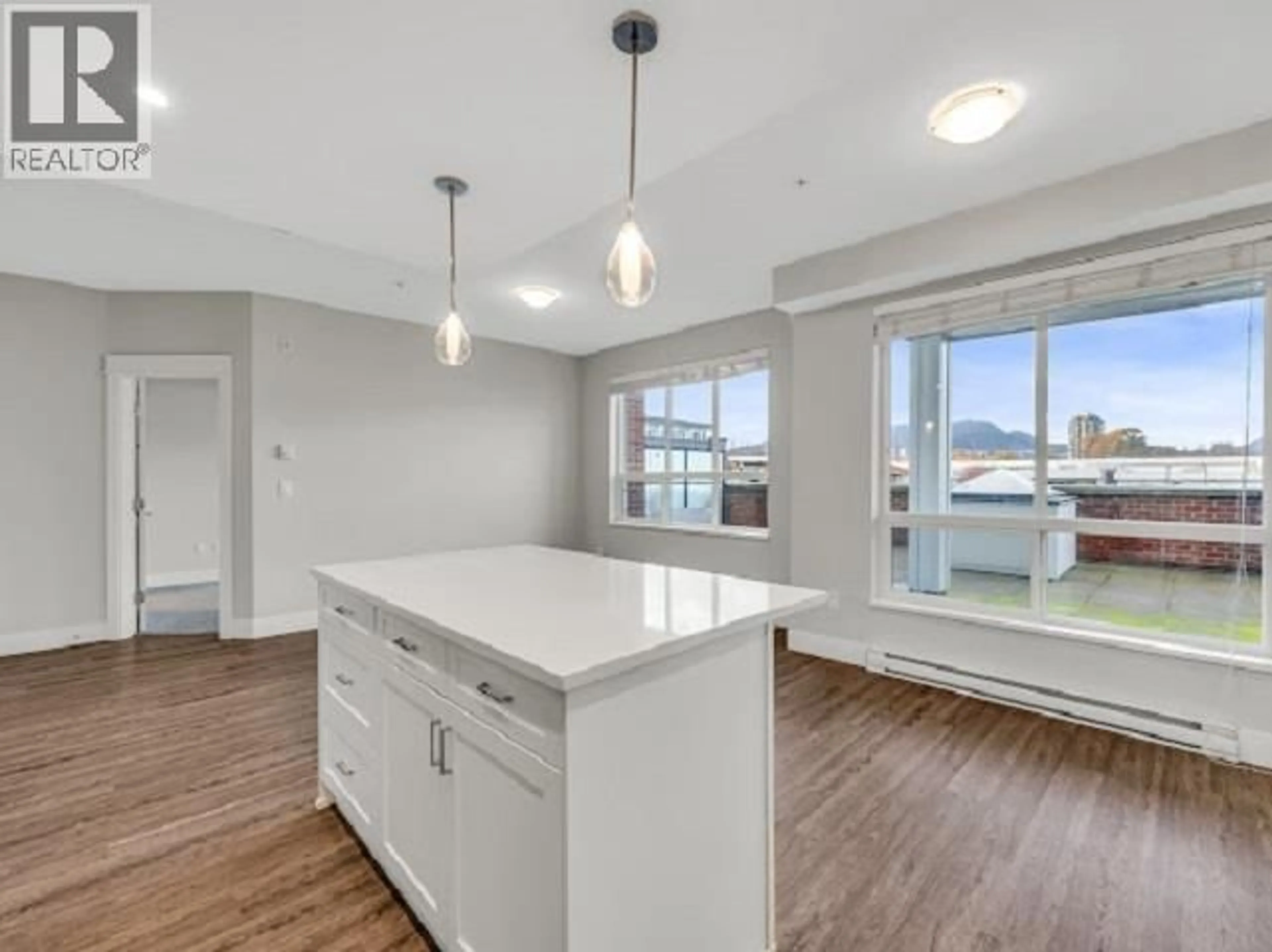 Open concept kitchen, wood/laminate floor for 4301 - 2180 KELLY AVENUE, Port Coquitlam British Columbia V3C0L1