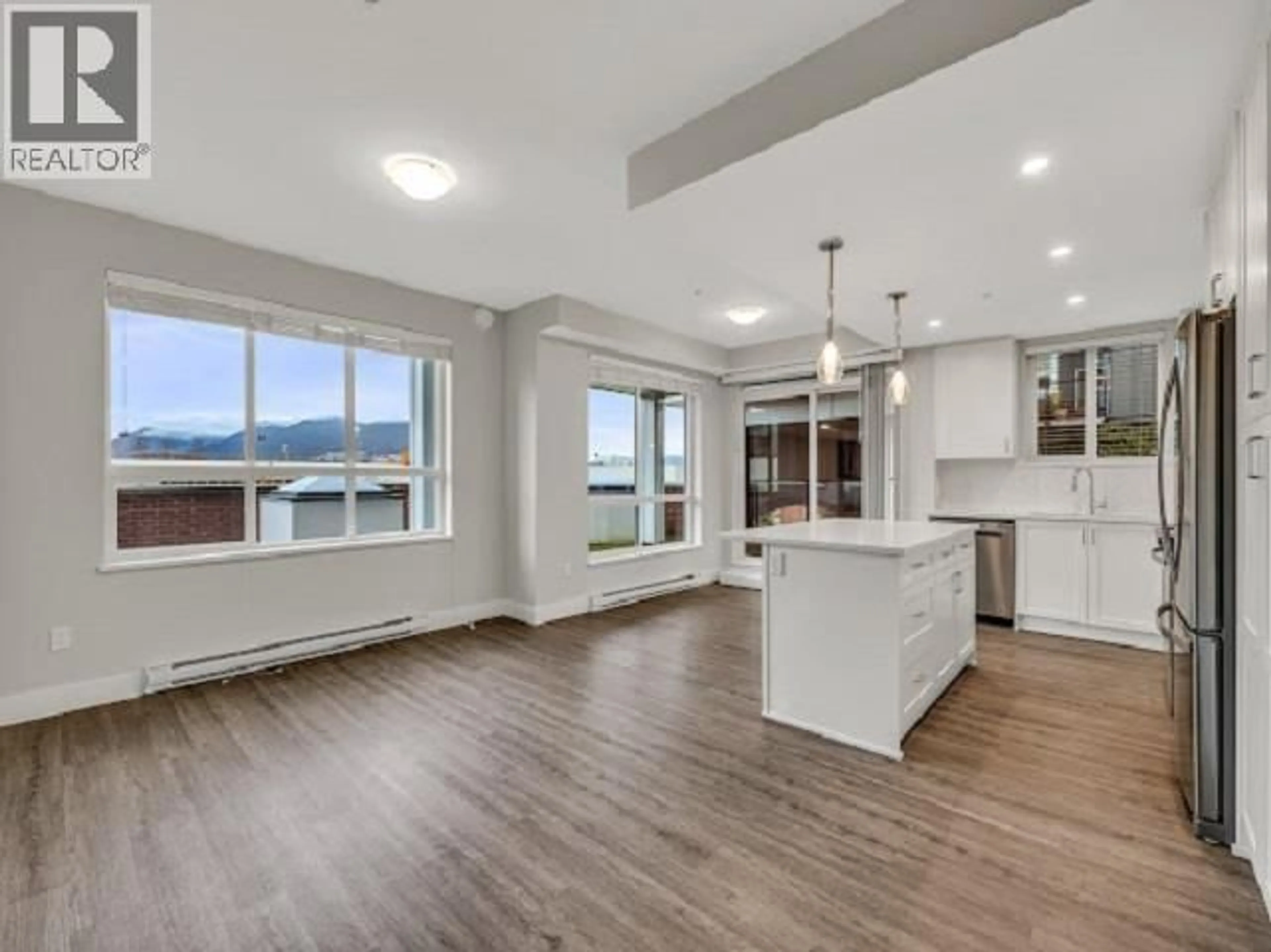 Open concept kitchen, wood/laminate floor for 4301 - 2180 KELLY AVENUE, Port Coquitlam British Columbia V3C0L1