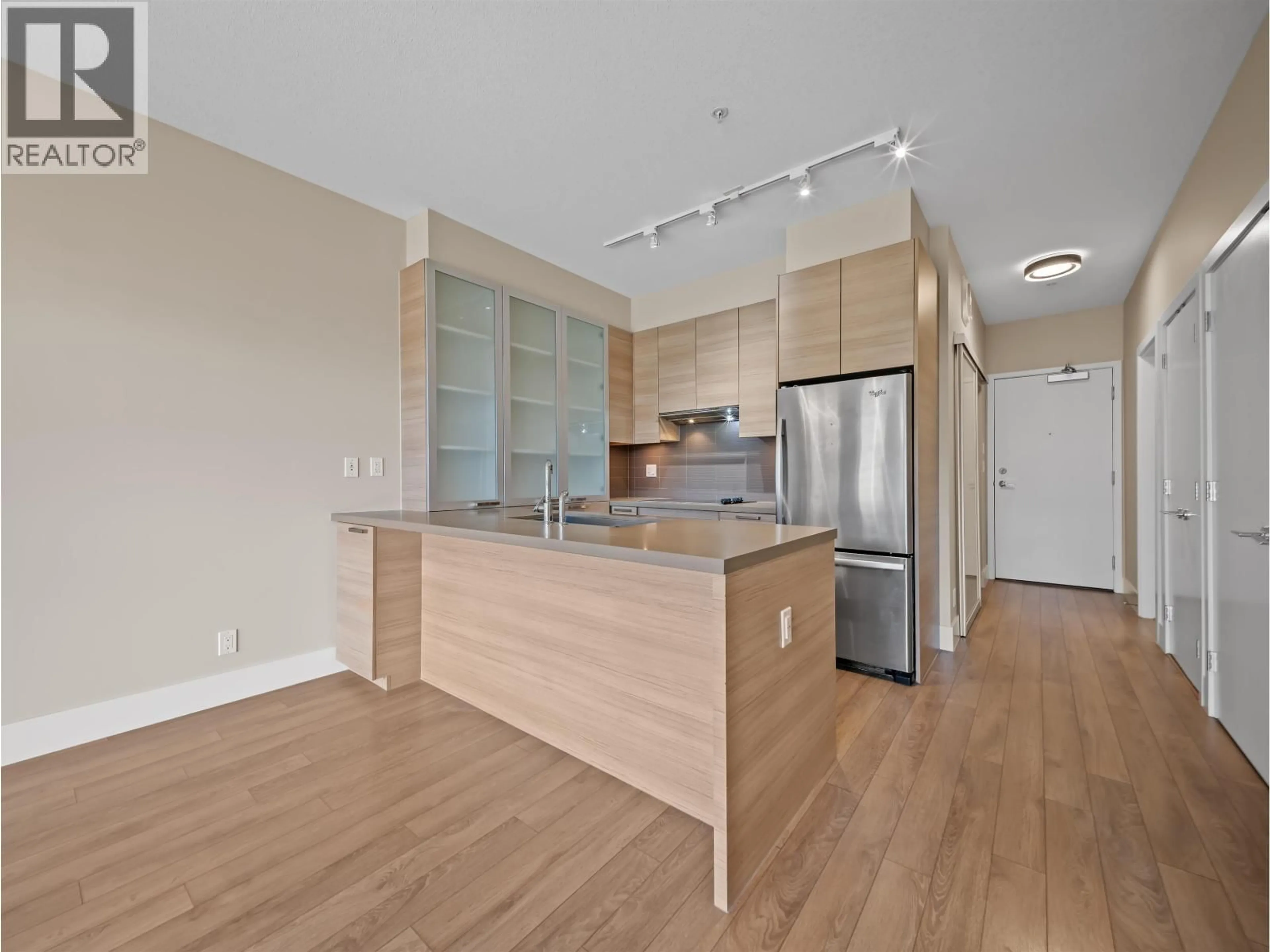 Open concept kitchen, wood/laminate floor for 215 - 3606 ALDERCREST DRIVE, North Vancouver British Columbia V7G0A3