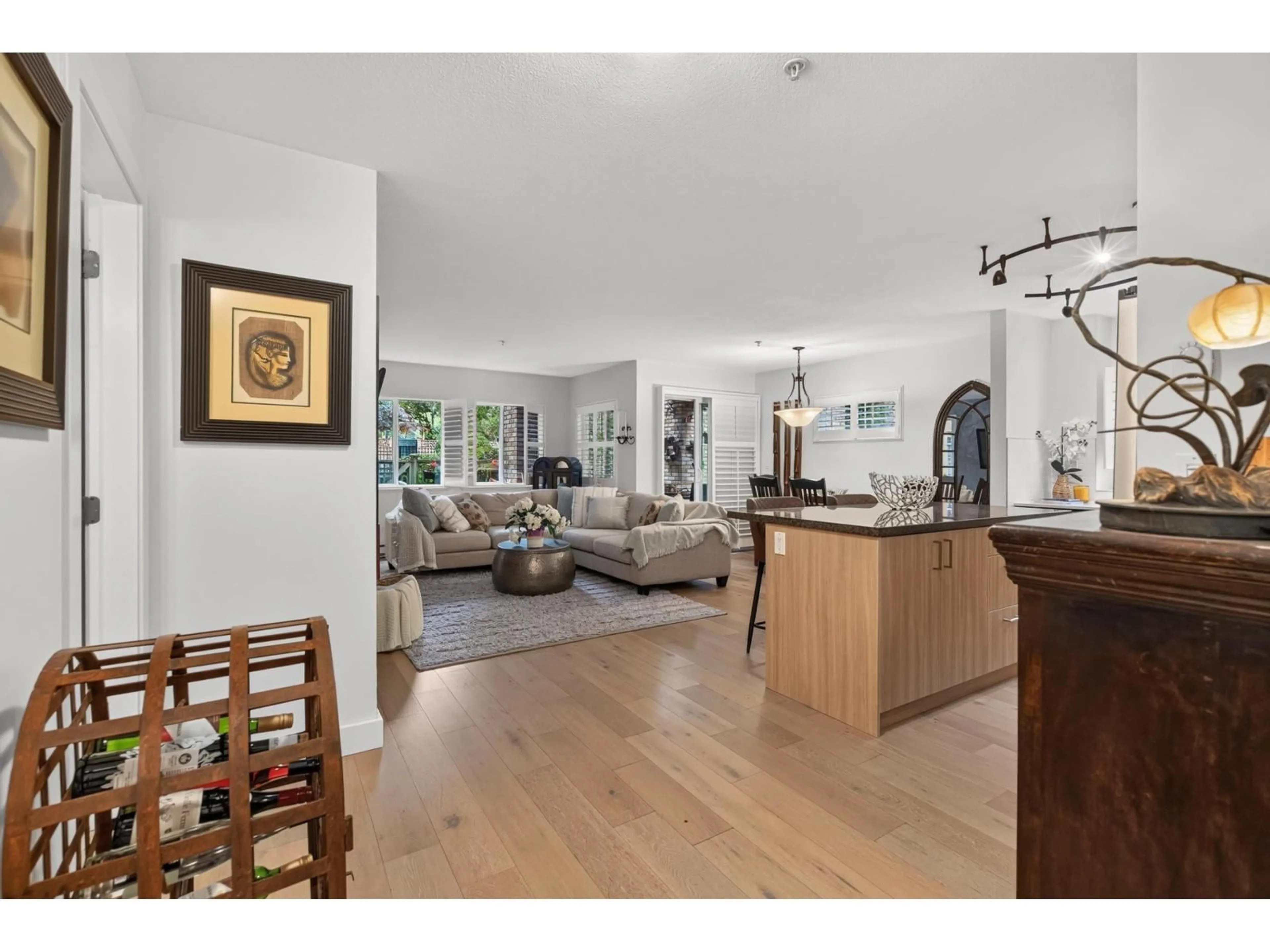 Open concept kitchen, wood/laminate floor for 209 - 8717 160 STREET, Surrey British Columbia V4N5X7