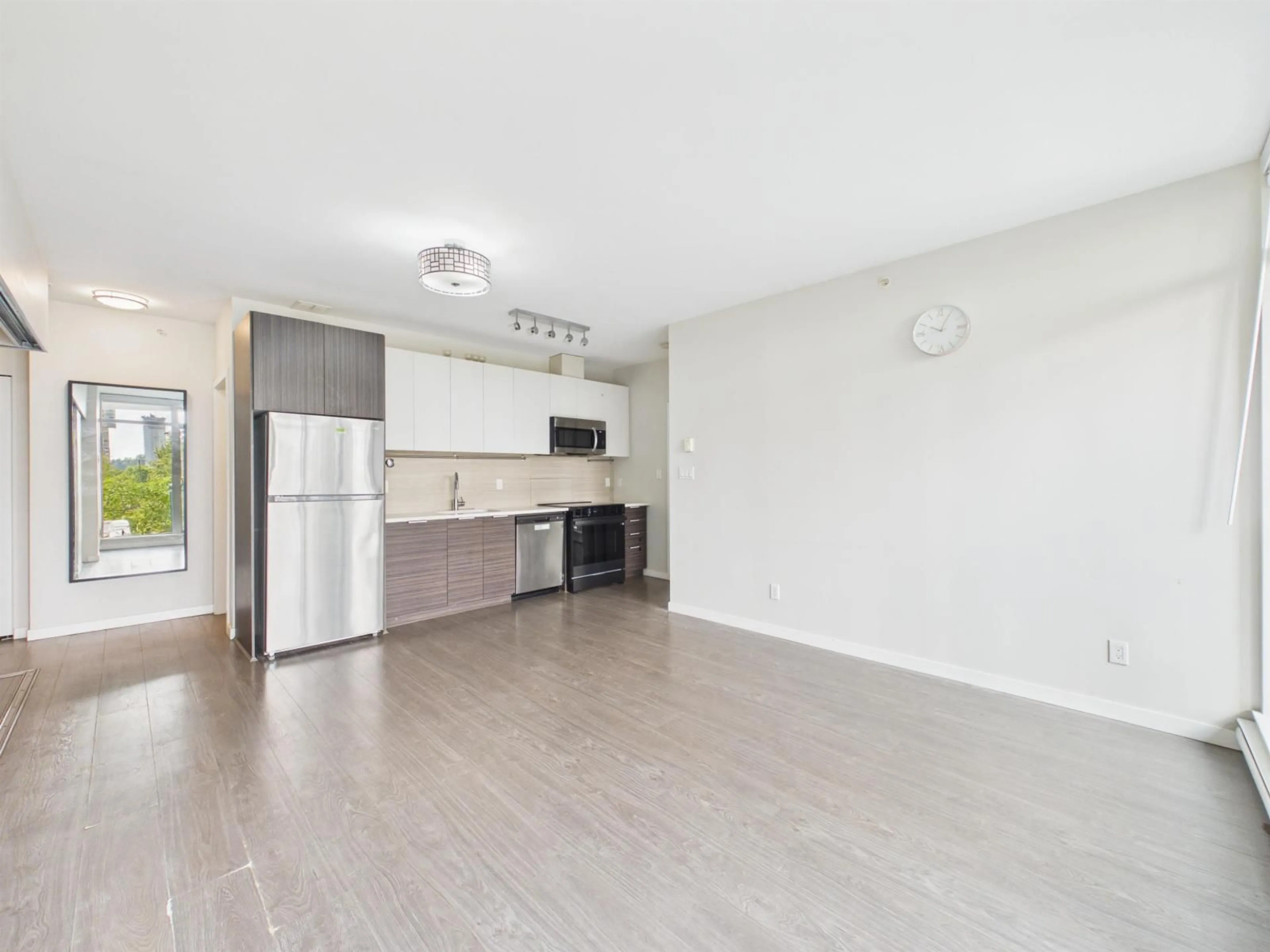 Open concept kitchen, unknown for 202 - 13303 103A AVENUE, Surrey British Columbia V3T0K6