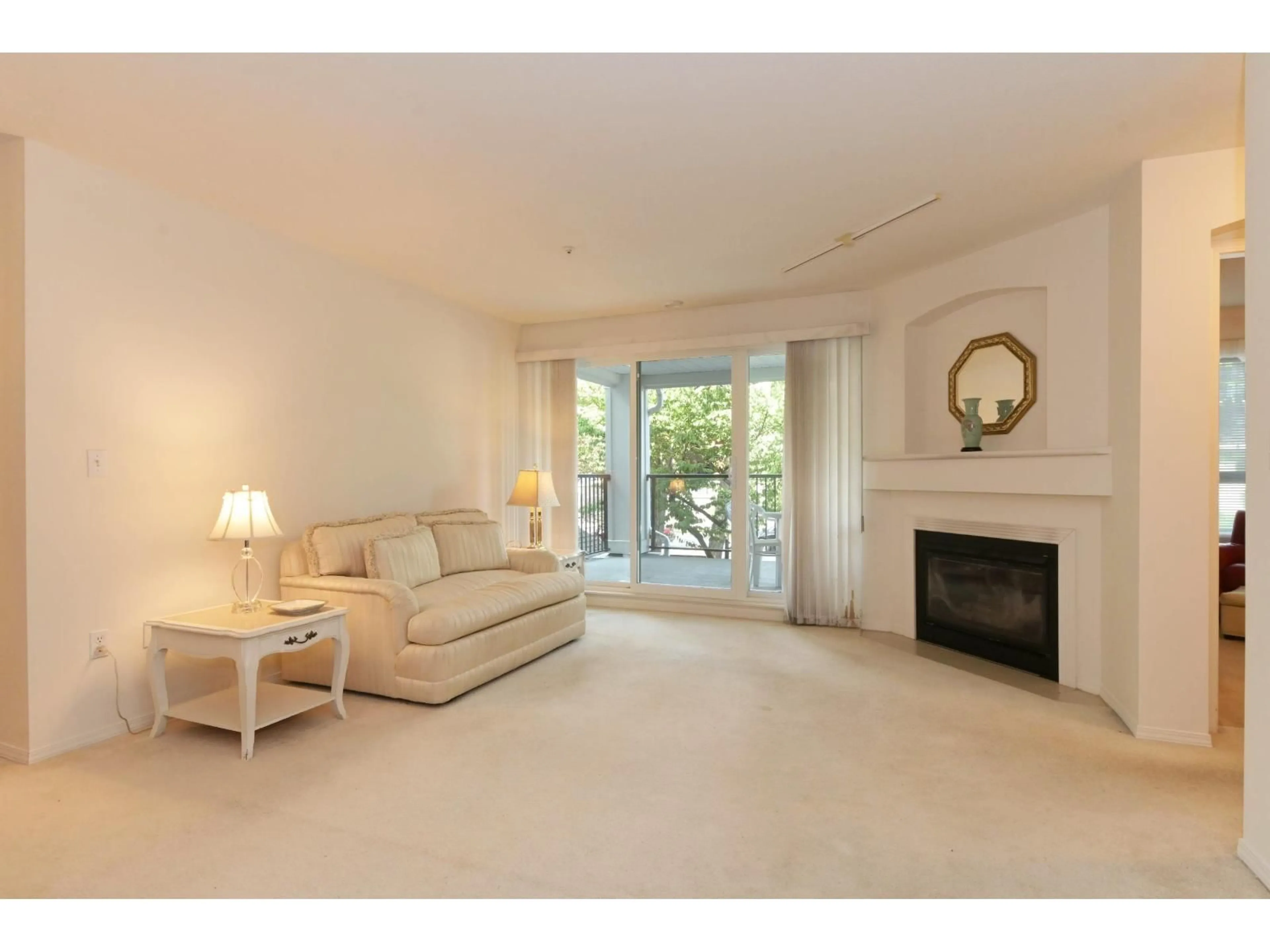 Living room with furniture, unknown for 101 - 20976 56 AVENUE, Langley British Columbia V3A7Z2