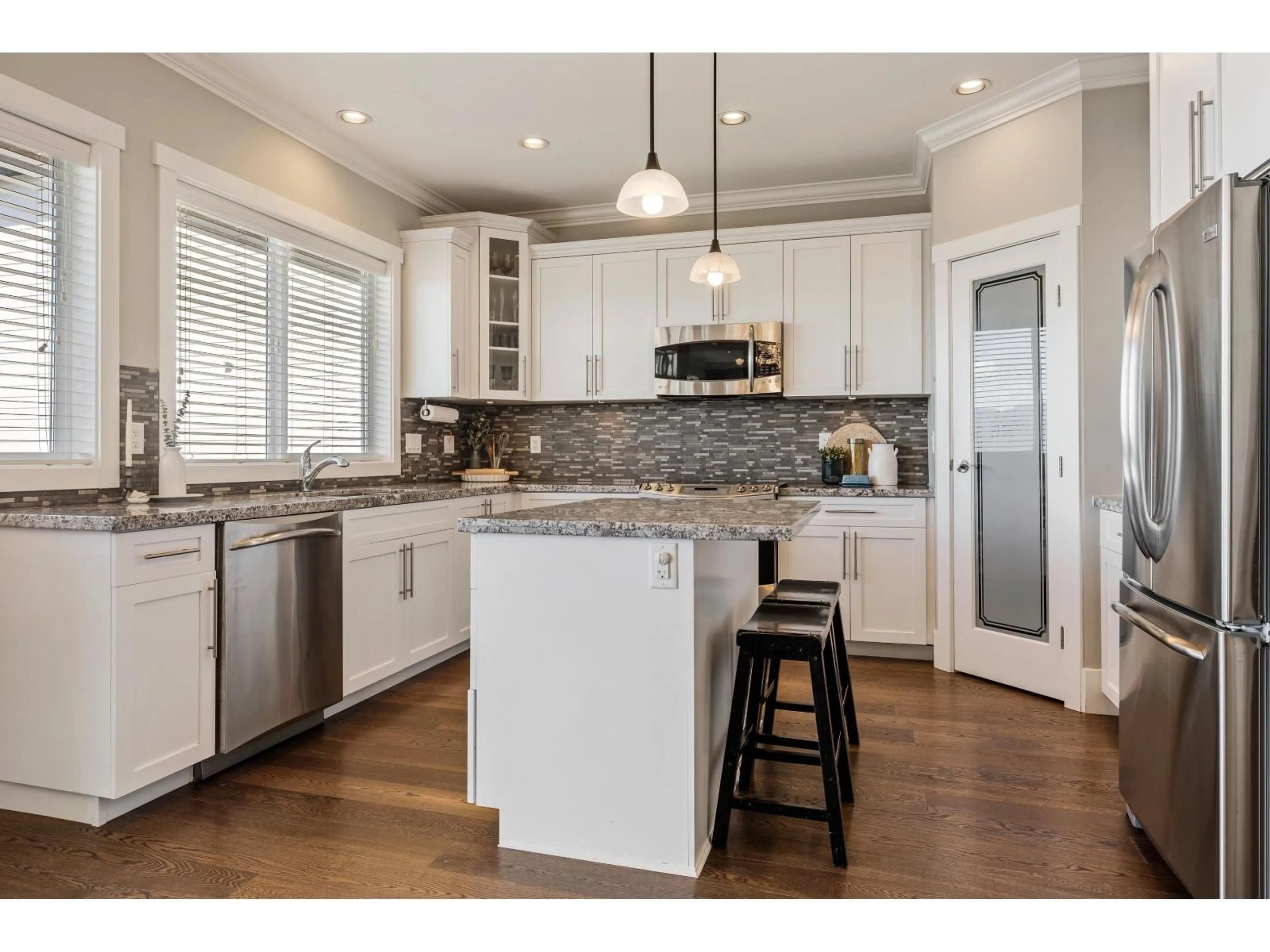 Open concept kitchen, wood/laminate floor for 50473 KINGSTON DRIVE, Chilliwack British Columbia V4Z0C2