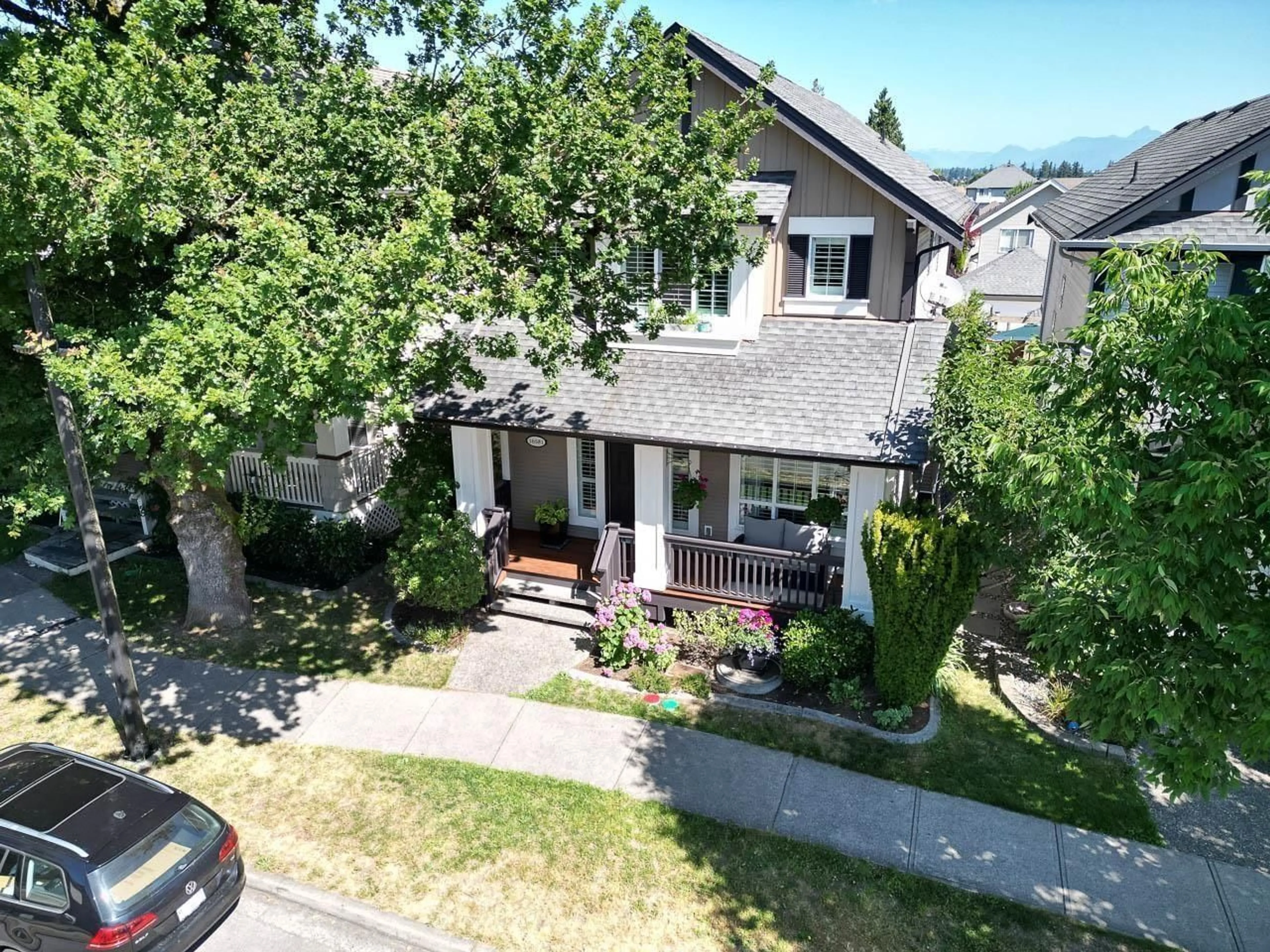 A pic from outside/outdoor area/front of a property/back of a property/a pic from drone, street for 16581 60 AVENUE, Surrey British Columbia V3S1S7