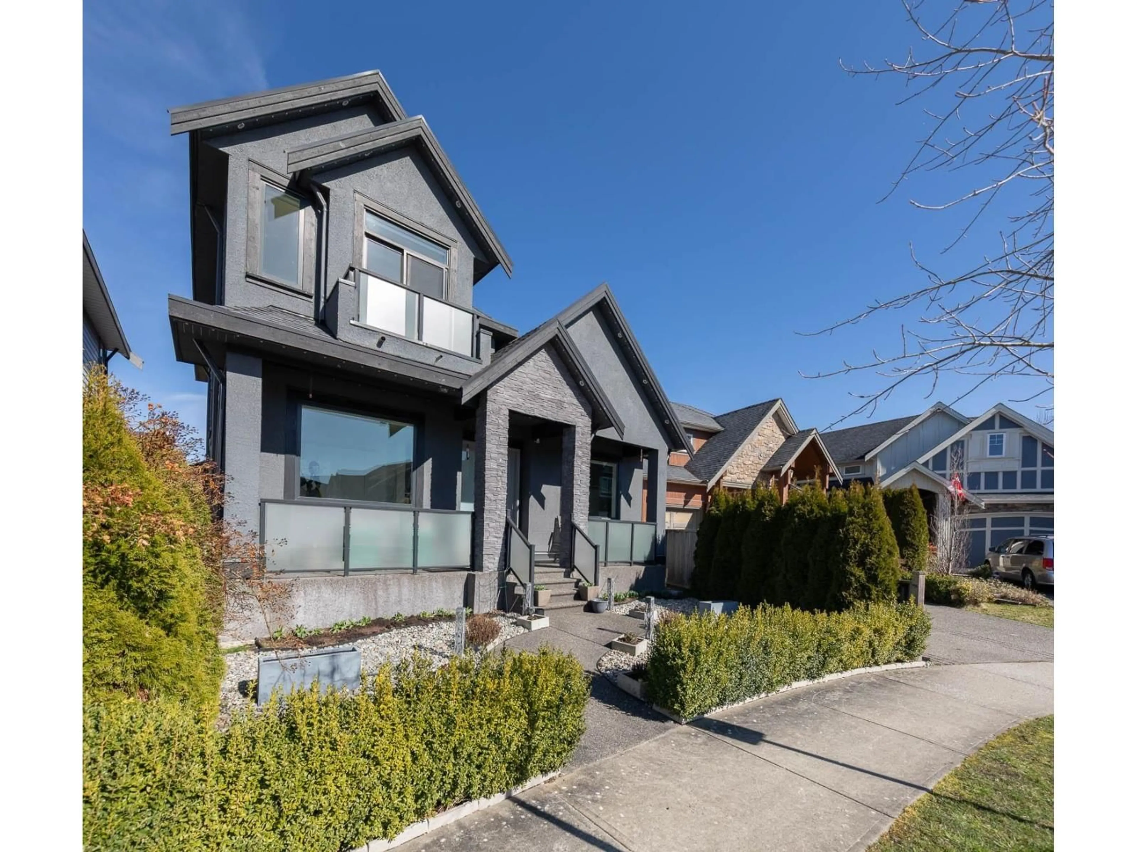 Home with vinyl exterior material, street for 17457 2B AVENUE, Surrey British Columbia V3Z6R9