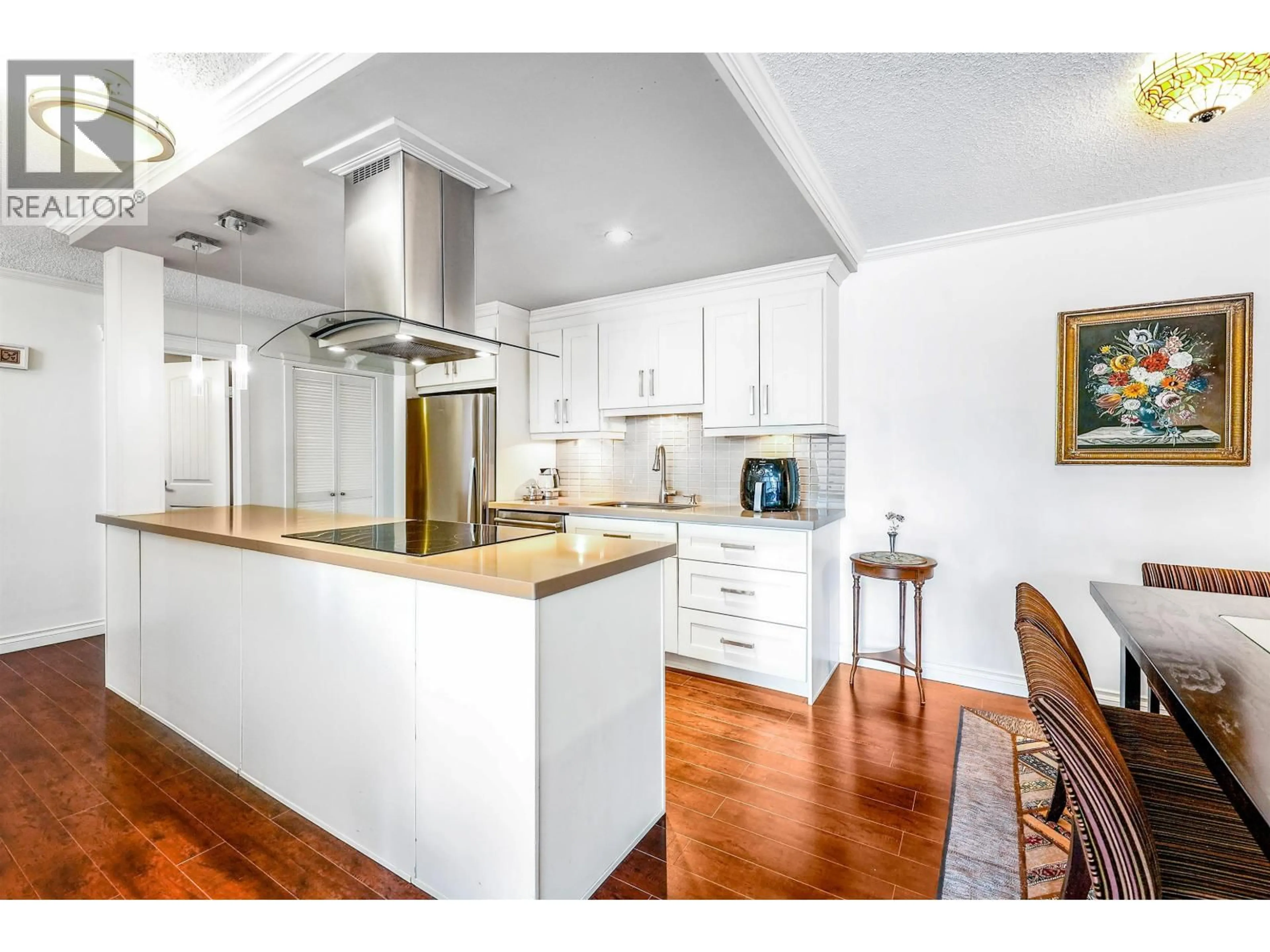 Open concept kitchen, wood/laminate floor for 306 - 2020 FULLERTON AVENUE, North Vancouver British Columbia V7P3G3