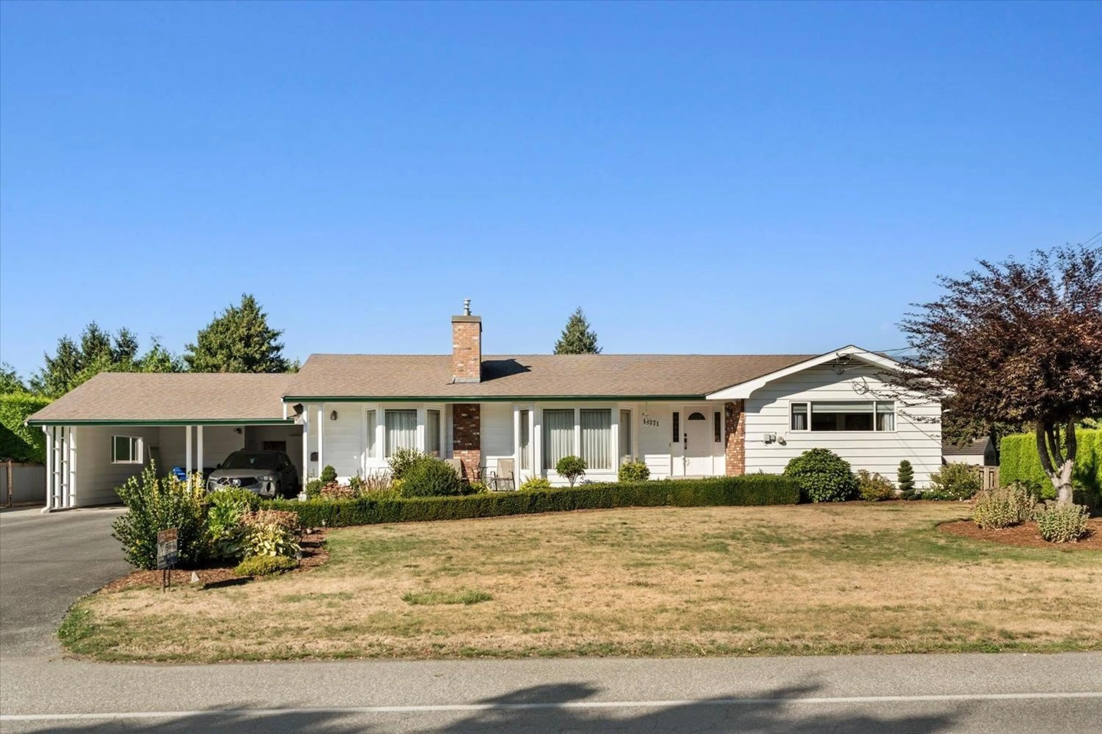 Home with vinyl exterior material, street for 10371 KENT ROAD, Chilliwack British Columbia V2P5X9