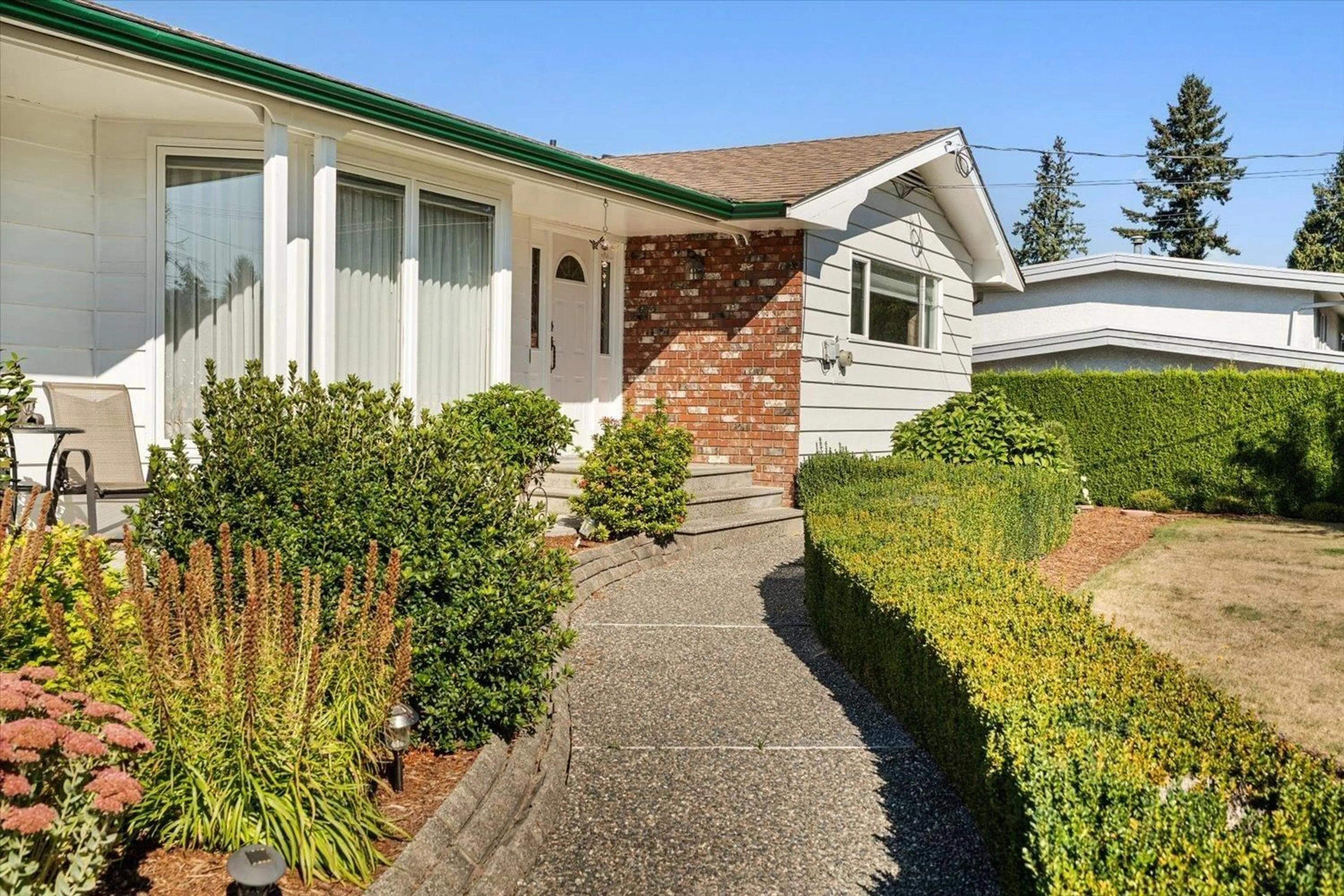Home with vinyl exterior material, street for 10371 KENT ROAD, Chilliwack British Columbia V2P5X9
