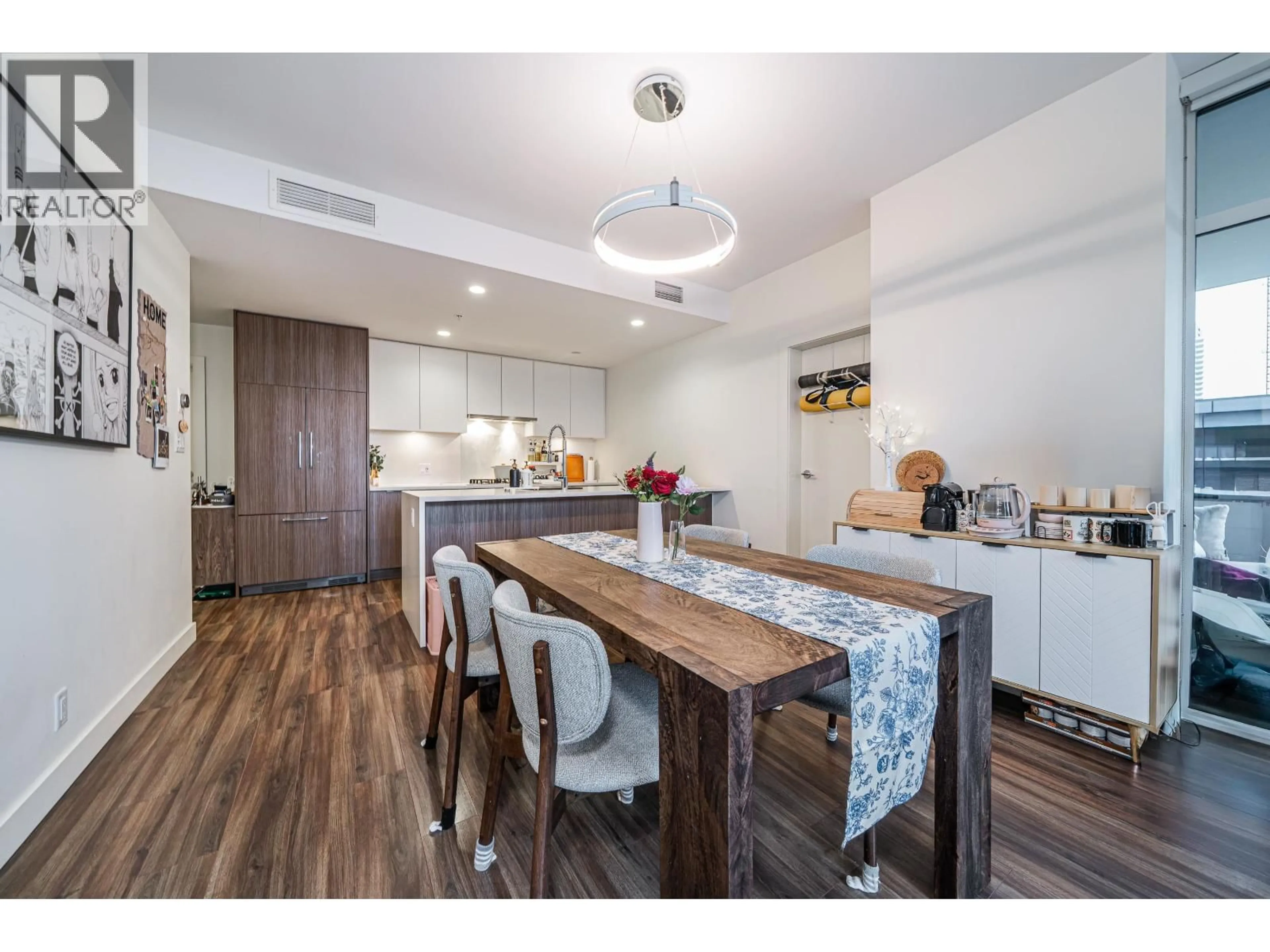 Open concept kitchen, wood/laminate floor for 601 - 4465 JUNEAU STREET, Burnaby British Columbia V5C0L8