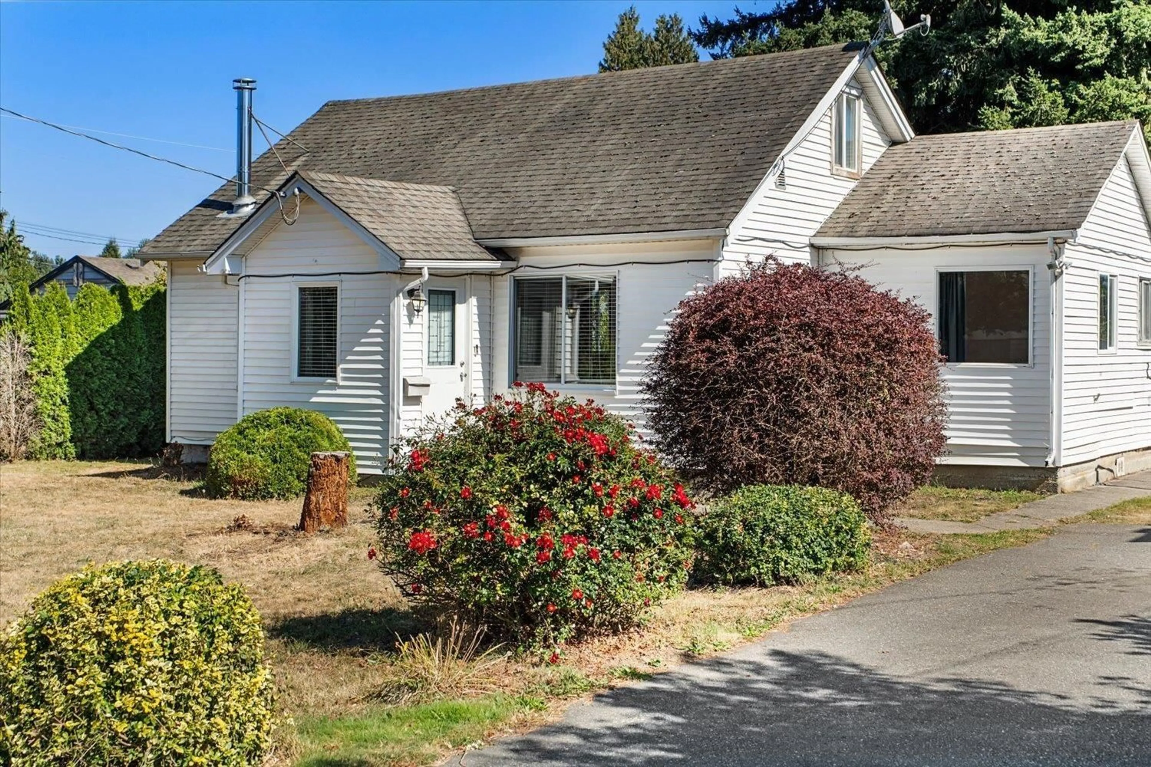 Home with vinyl exterior material, street for 9260 MCNAUGHT ROAD, Chilliwack British Columbia V2P6E6