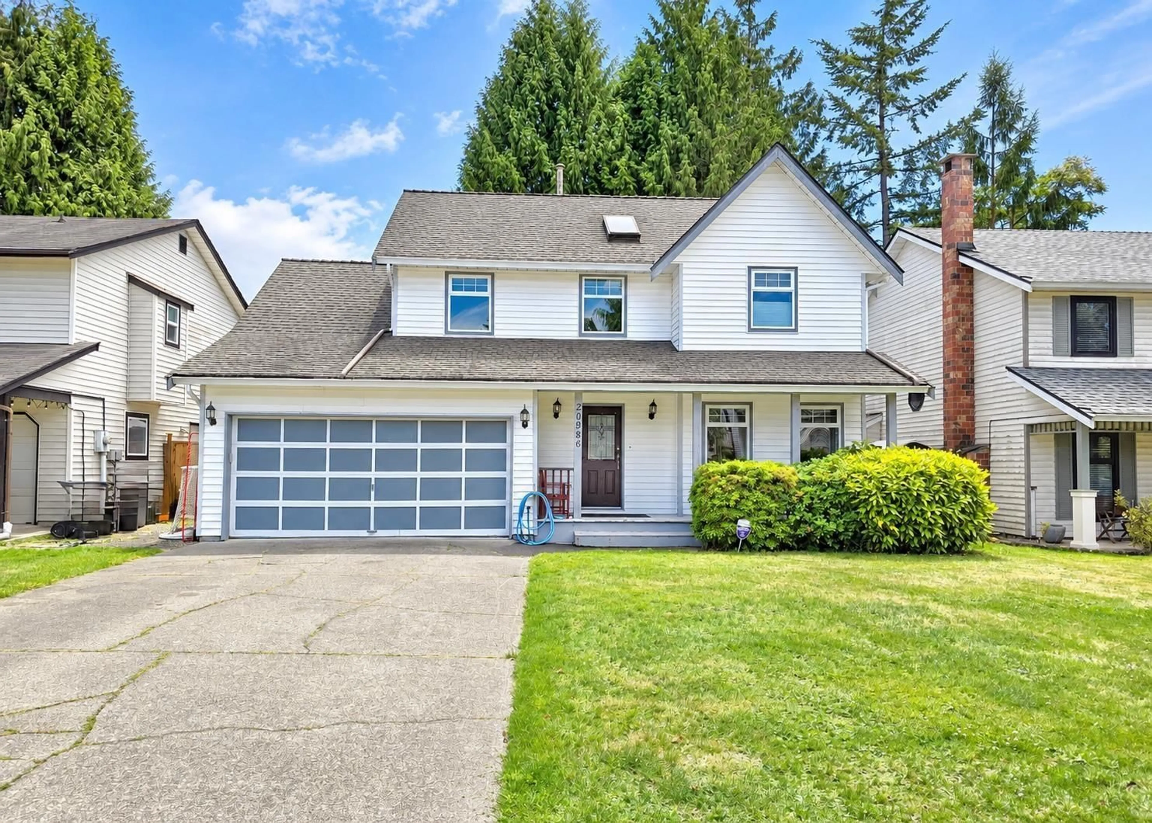 Home with vinyl exterior material, street for 20986 93A AVENUE, Langley British Columbia V1M1R8