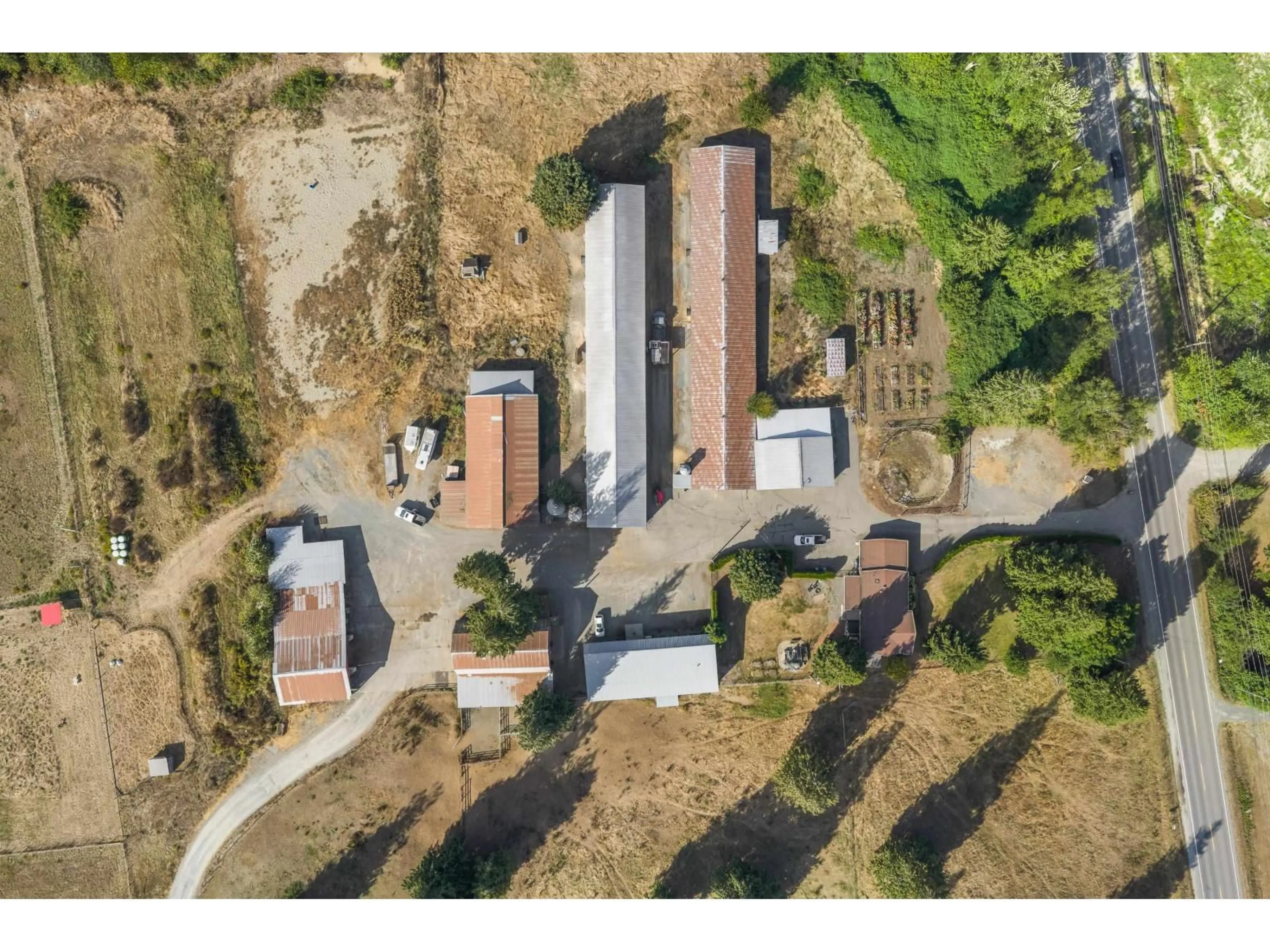 A pic from outside/outdoor area/front of a property/back of a property/a pic from drone, street for 2481 LEFEUVRE ROAD, Abbotsford British Columbia V4X1E3