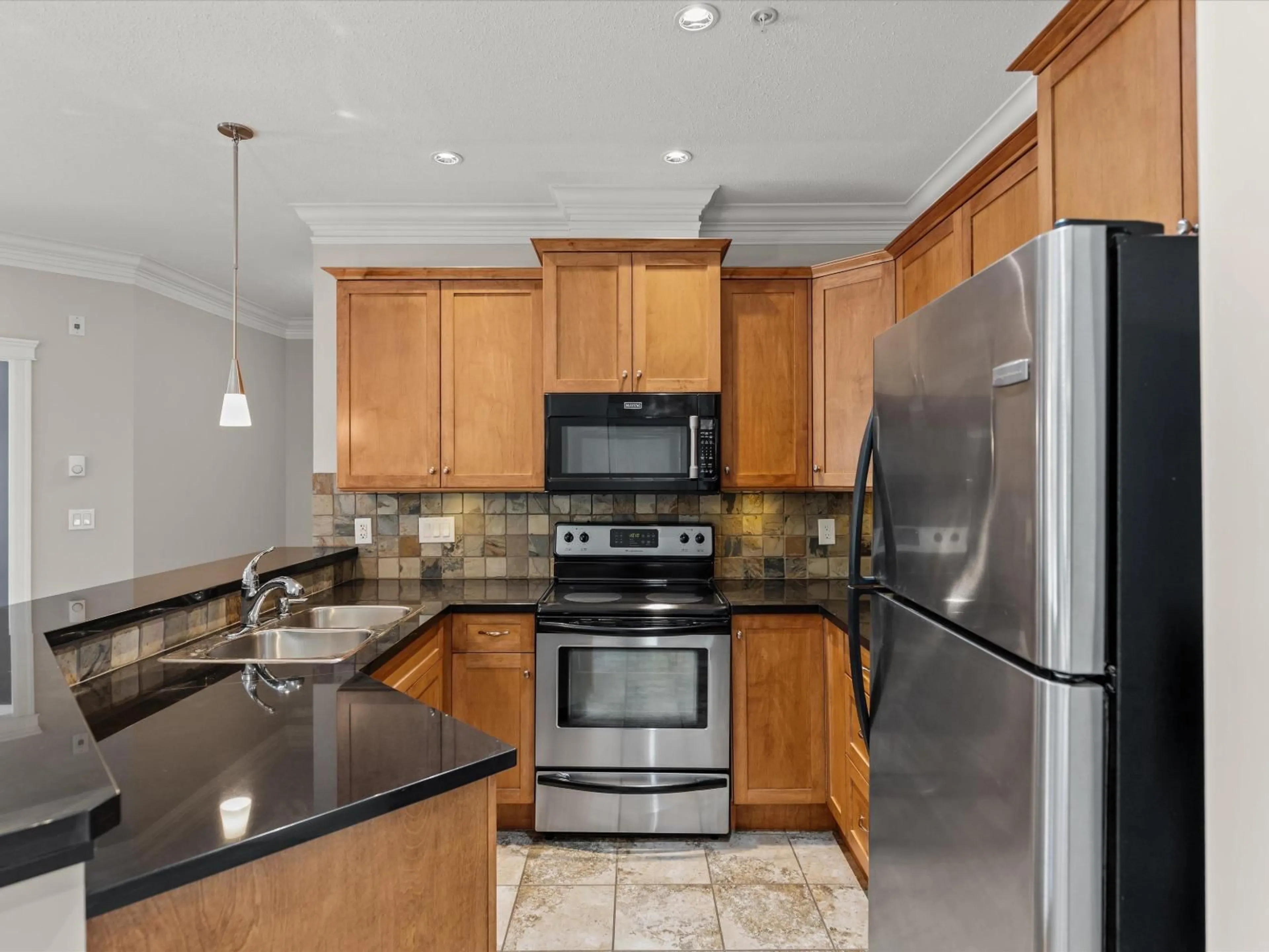 Standard kitchen, ceramic/tile floor for 103C - 45595 TAMIHI WAY, Chilliwack British Columbia V2R0G3