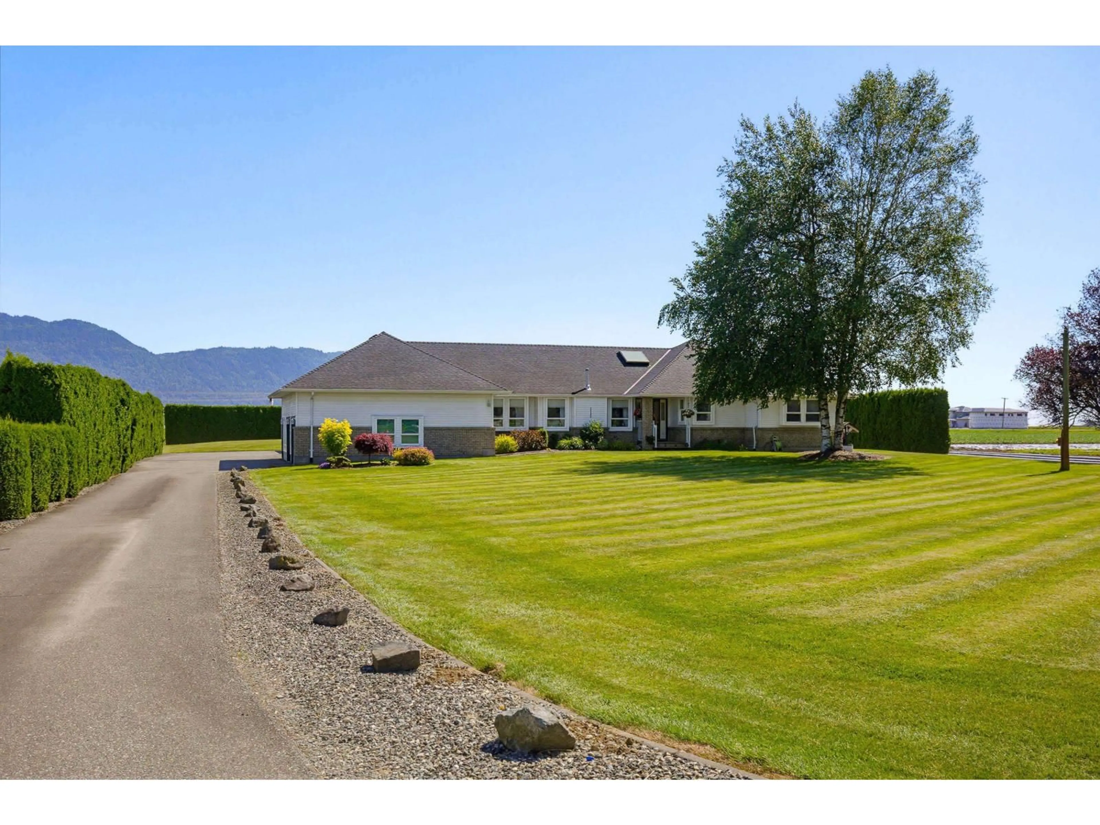 A pic from outside/outdoor area/front of a property/back of a property/a pic from drone, mountain view for 40406 NO. 3 ROAD, Abbotsford British Columbia V3G2R6